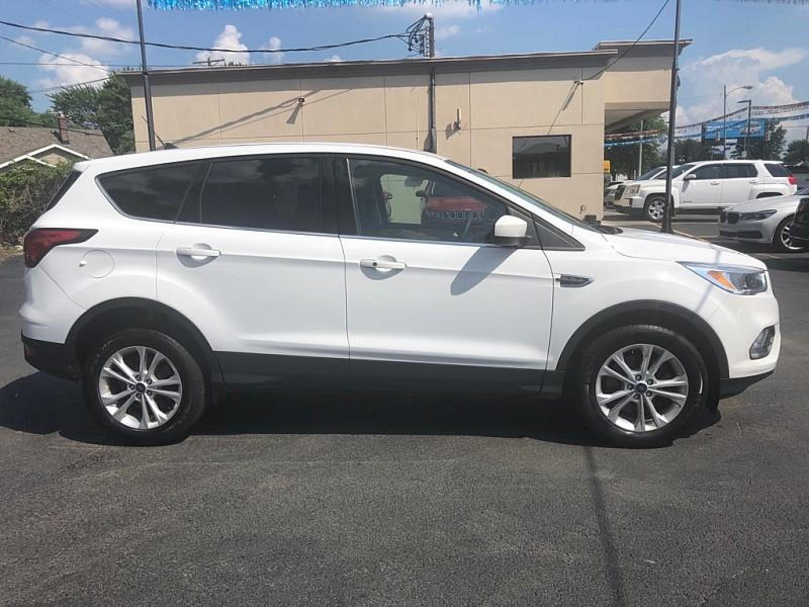 2019 WHITE /BLACK Ford Escape (1FMCU9GD1KU) with an 4-Cyl 1.5 Liter engine, Automatic transmission, located at 3304 Woodville Road, Northwood, OH, 43619, (419) 210-8019, 41.612694, -83.480743 - We are #1 Auto Loan for Good Bad or No Credit we have hundreds of vehicles to choose from stop on in or just fill out our online application to get approved for auto financing and see your credit score for free by visiting our website today. We have Low Payment Options and Terms Available to Suit - Photo #6