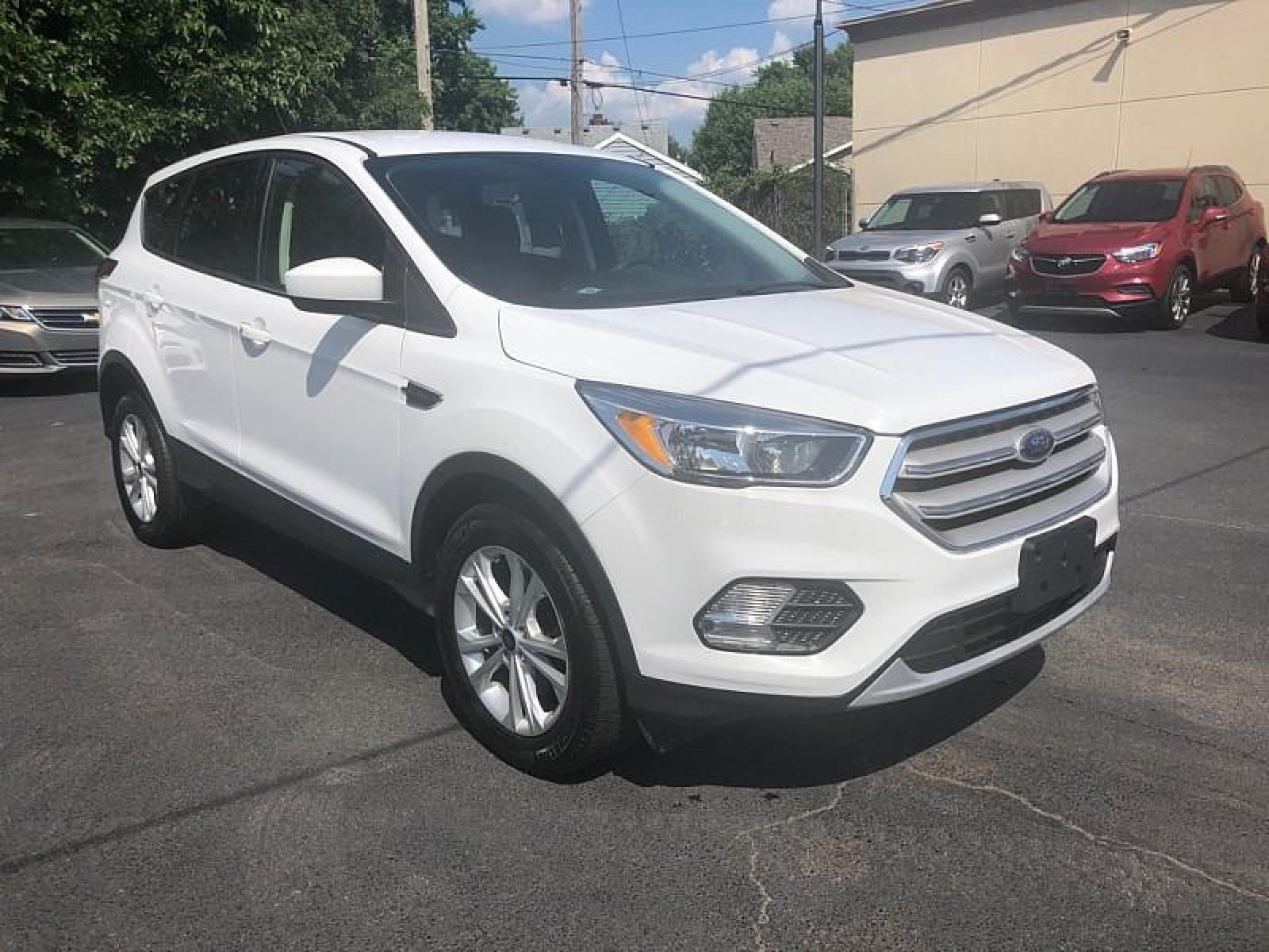 2019 WHITE /BLACK Ford Escape (1FMCU9GD1KU) with an 4-Cyl 1.5 Liter engine, Automatic transmission, located at 3304 Woodville Road, Northwood, OH, 43619, (419) 210-8019, 41.612694, -83.480743 - We are #1 Auto Loan for Good Bad or No Credit we have hundreds of vehicles to choose from stop on in or just fill out our online application to get approved for auto financing and see your credit score for free by visiting our website today. We have Low Payment Options and Terms Available to Suit - Photo #7
