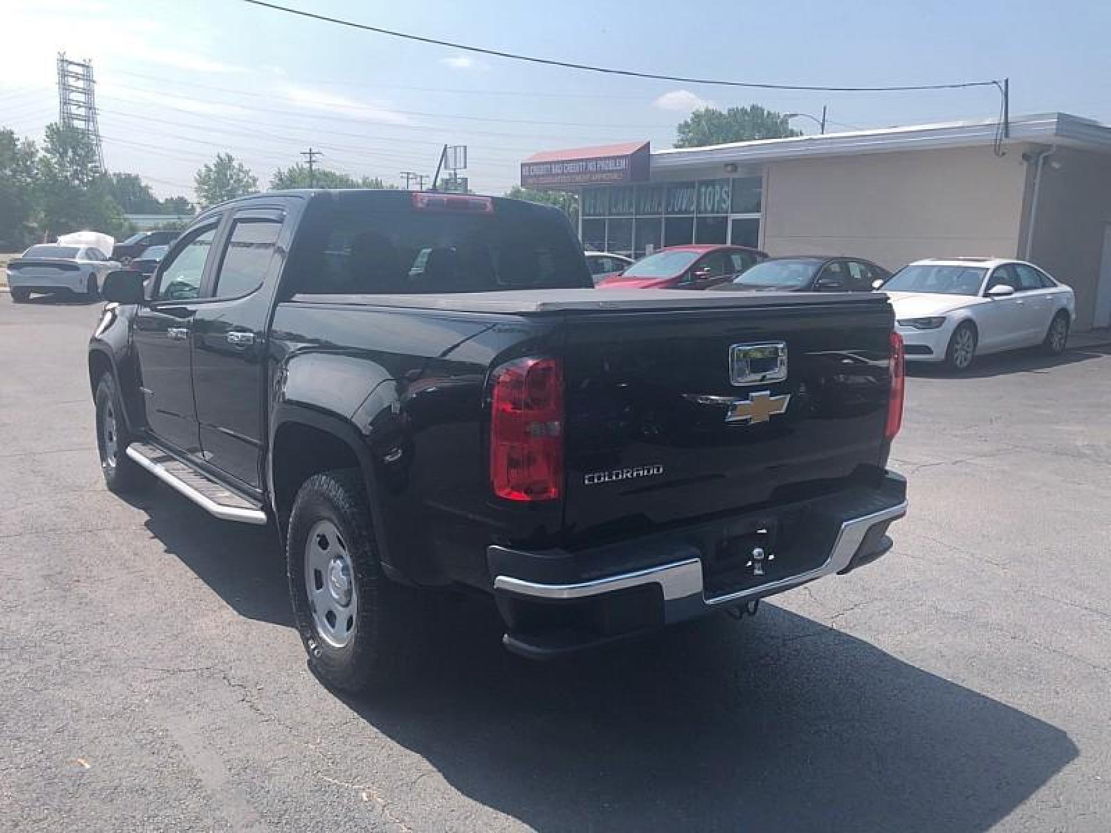 2017 BLACK /GRAY Chevrolet Colorado 2WD (1GCGSBEA5H1) with an 4-Cyl VVT 2.5 Liter engine, Automatic 6-Spd transmission, located at 3304 Woodville Road, Northwood, OH, 43619, (419) 210-8019, 41.612694, -83.480743 - We are #1 Auto Loan for Good Bad or No Credit we have hundreds of vehicles to choose from stop on in or just fill out our online application to get approved for auto financing and see your credit score for free by visiting our website today. We have Low Payment Options and Terms Available to Suit - Photo #6