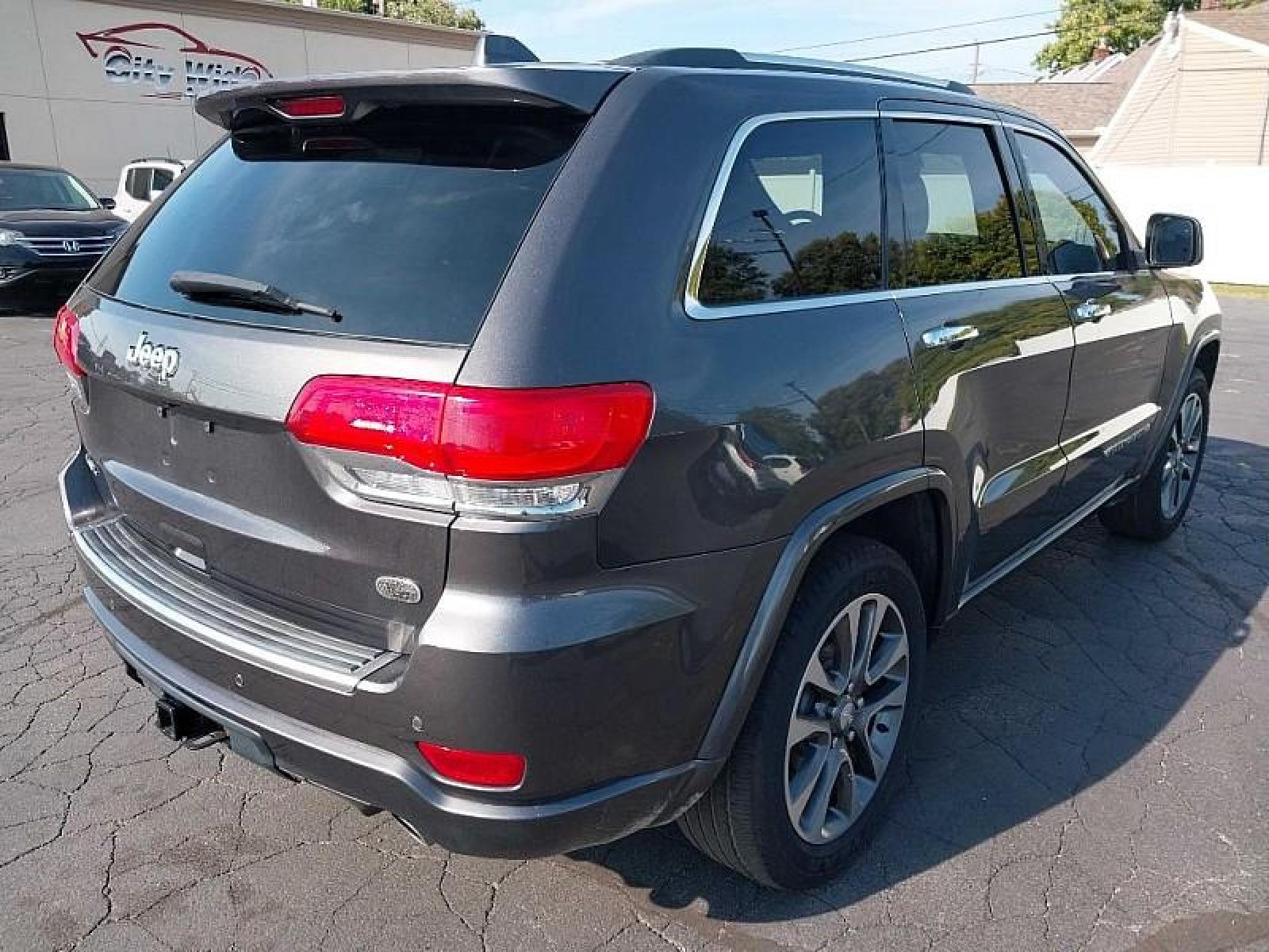2017 GRAY /BLACK Jeep Grand Cherokee (1C4RJFCG9HC) with an V6 VVT 3.6 Liter engine, Automatic 8-Spd transmission, located at 3304 Woodville Road, Northwood, OH, 43619, (419) 210-8019, 41.612694, -83.480743 - We are #1 Auto Loan for Good Bad or No Credit we have hundreds of vehicles to choose from stop on in or just fill out our online application to get approved for auto financing and see your credit score for free by visiting our website today. We have Low Payment Options and Terms Available to Suit - Photo #4
