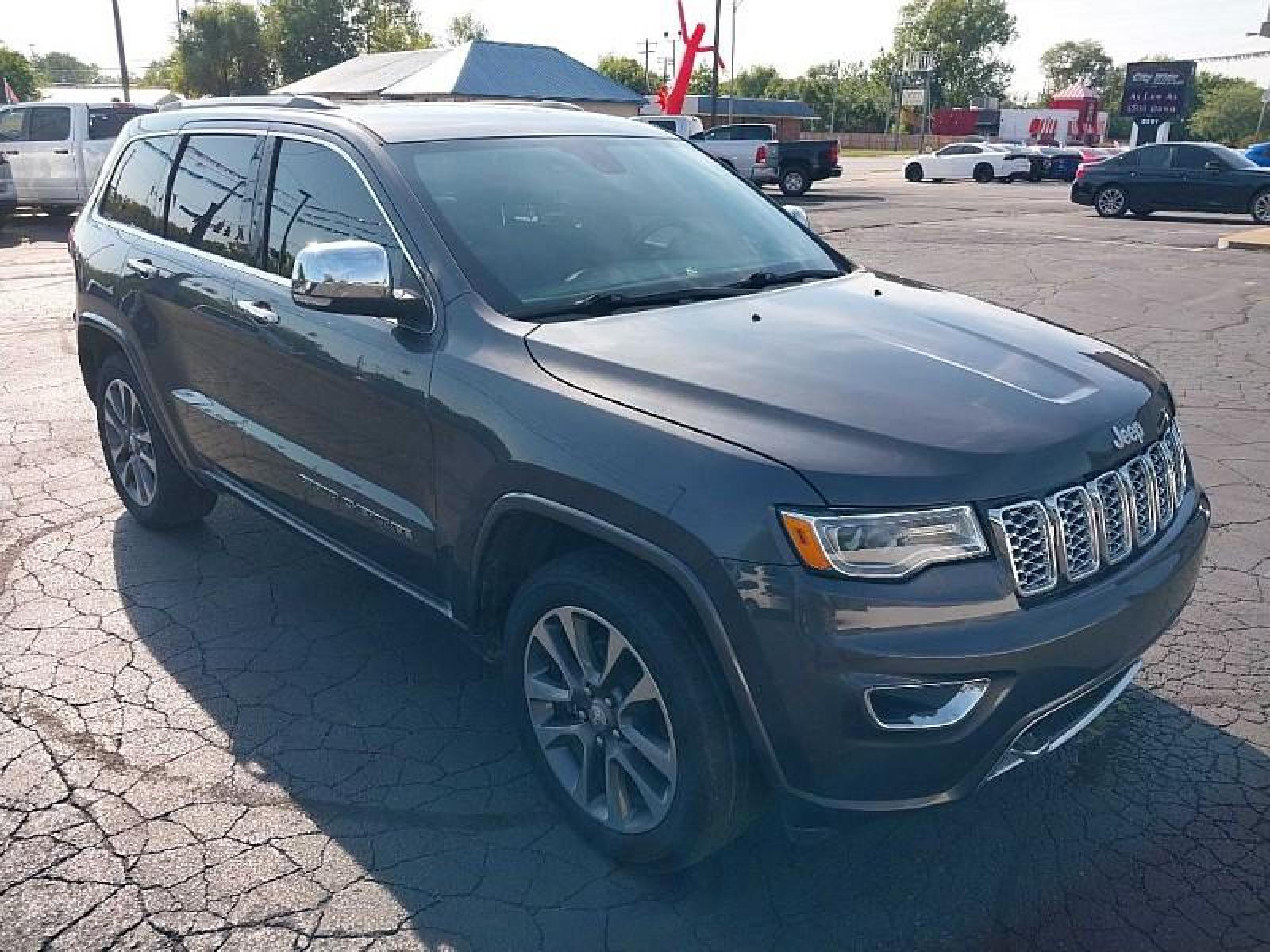 2017 GRAY /BLACK Jeep Grand Cherokee (1C4RJFCG9HC) with an V6 VVT 3.6 Liter engine, Automatic 8-Spd transmission, located at 3304 Woodville Road, Northwood, OH, 43619, (419) 210-8019, 41.612694, -83.480743 - We are #1 Auto Loan for Good Bad or No Credit we have hundreds of vehicles to choose from stop on in or just fill out our online application to get approved for auto financing and see your credit score for free by visiting our website today. We have Low Payment Options and Terms Available to Suit - Photo #6