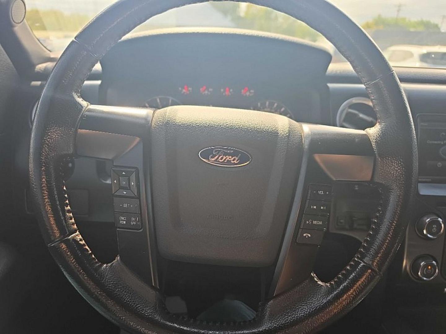 2013 BLACK /BLACK Ford F-150 XLT SuperCrew 6.5-ft. Bed 4WD (1FTFW1EF2DF) with an 5.0L V8 engine, 6-Speed Automatic transmission, located at 3304 Woodville Road, Northwood, OH, 43619, (419) 210-8019, 41.612694, -83.480743 - Your #1 Destination for Auto Loans and mdash;No Matter Your Credit!At our dealership, we believe everyone deserves the opportunity to drive their dream car and mdash;whether you have good credit, bad credit, or no credit at all. With a wide selection of hundreds of cars, trucks, and SUVs, you'll fin- Photo#20