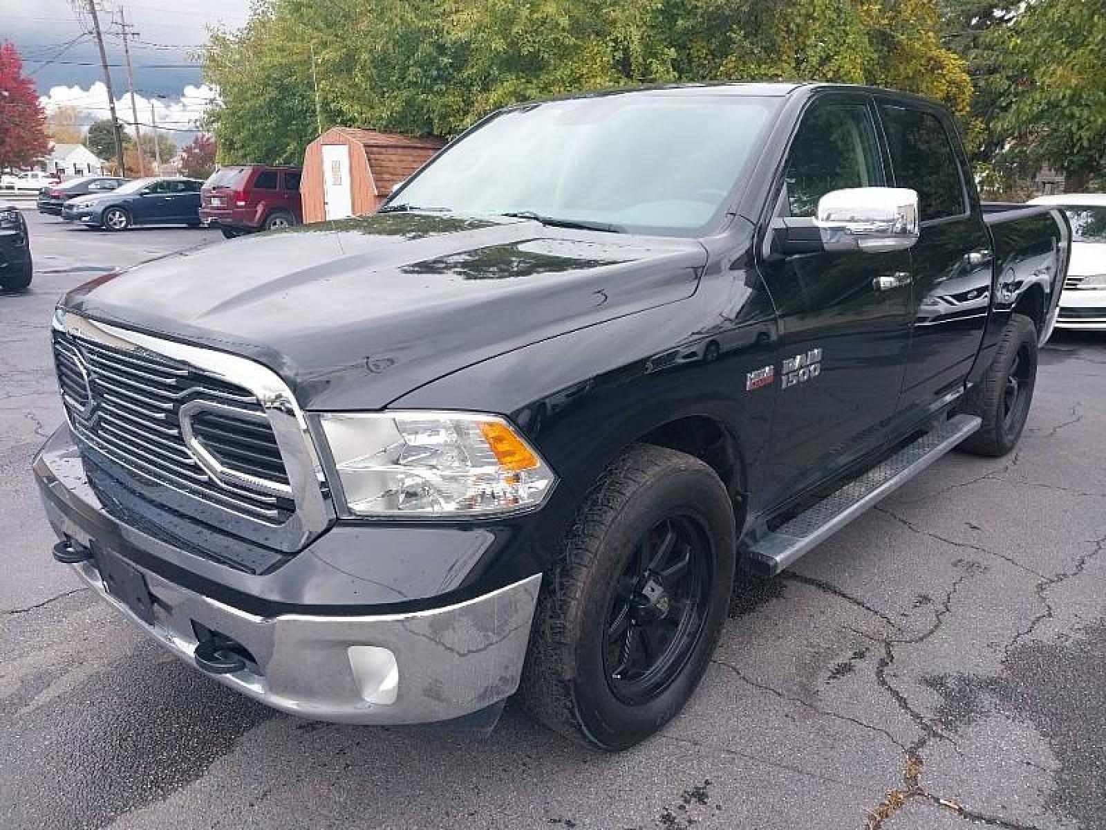 2014 BLACK /GRAY Ram 1500 4WD (1C6RR7LT3ES) with an V8 HEMI 5.7 Liter engine, Automatic 8-Spd transmission, located at 3304 Woodville Road, Northwood, OH, 43619, (419) 210-8019, 41.612694, -83.480743 - We are #1 Auto Loan for Good Bad or No Credit we have hundreds of vehicles to choose from stop on in or just fill out our online application to get approved for auto financing and see your credit score for free by visiting our website today. We have Low Payment Options and Terms Available to Suit - Photo #0