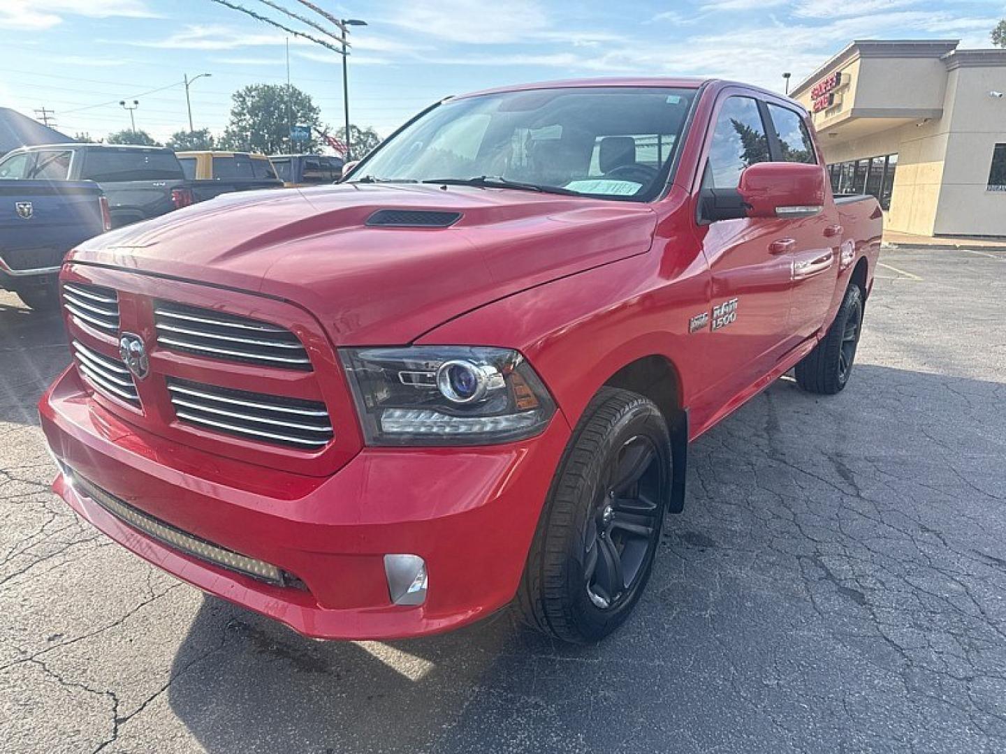 2015 RED /BLACK RAM 1500 Sport Crew Cab SWB 4WD (1C6RR7MT9FS) with an 5.7L V8 OHV 16V engine, 6-Speed Automatic transmission, located at 3304 Woodville Road, Northwood, OH, 43619, (419) 210-8019, 41.612694, -83.480743 - Your #1 Destination for Auto Loans and mdash;No Matter Your Credit!At our dealership, we believe everyone deserves the opportunity to drive their dream car and mdash;whether you have good credit, bad credit, or no credit at all. With a wide selection of hundreds of cars, trucks, and SUVs, you'll fin- Photo#0