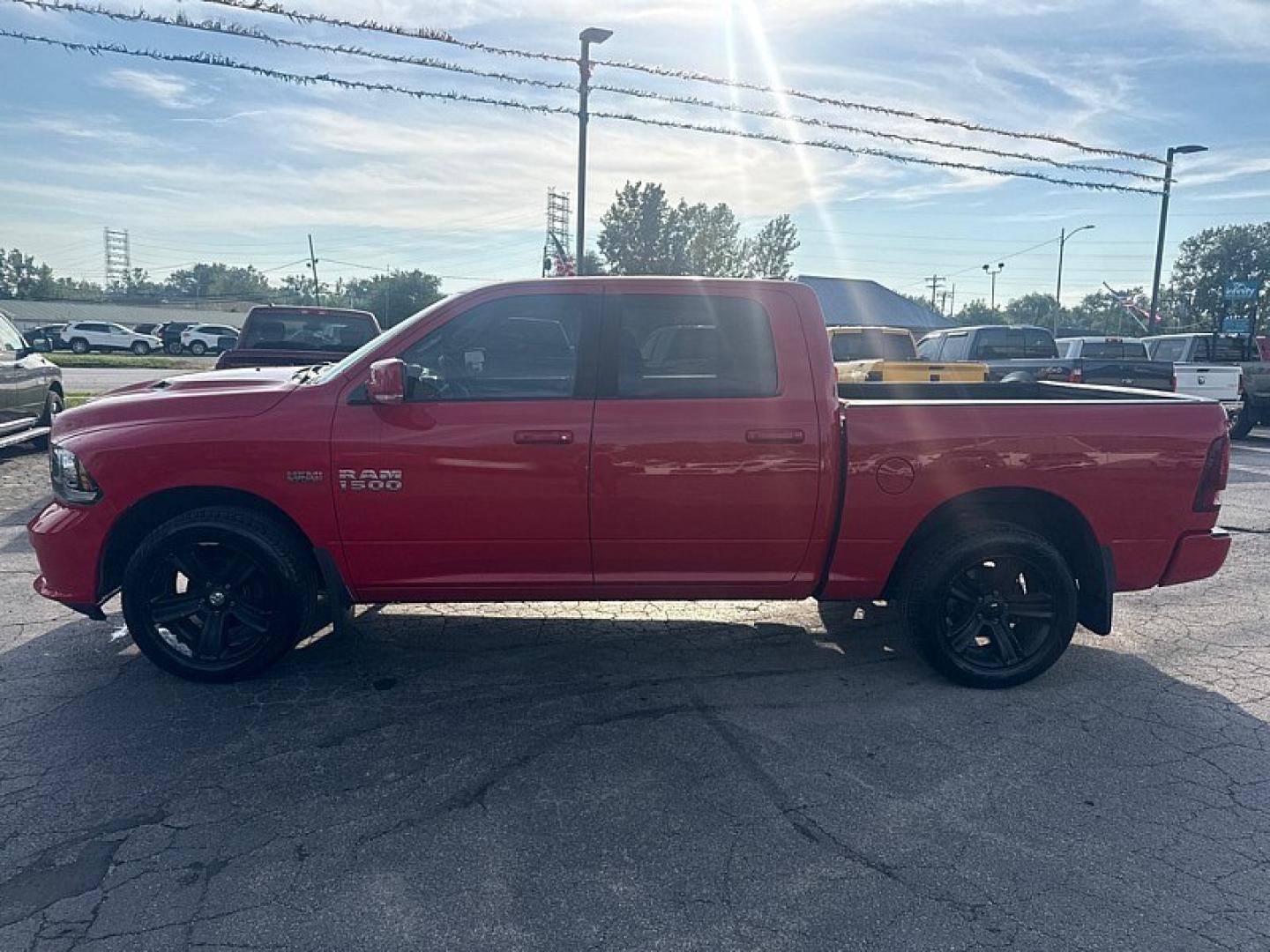 2015 RED /BLACK RAM 1500 Sport Crew Cab SWB 4WD (1C6RR7MT9FS) with an 5.7L V8 OHV 16V engine, 6-Speed Automatic transmission, located at 3304 Woodville Road, Northwood, OH, 43619, (419) 210-8019, 41.612694, -83.480743 - Your #1 Destination for Auto Loans and mdash;No Matter Your Credit!At our dealership, we believe everyone deserves the opportunity to drive their dream car and mdash;whether you have good credit, bad credit, or no credit at all. With a wide selection of hundreds of cars, trucks, and SUVs, you'll fin- Photo#1