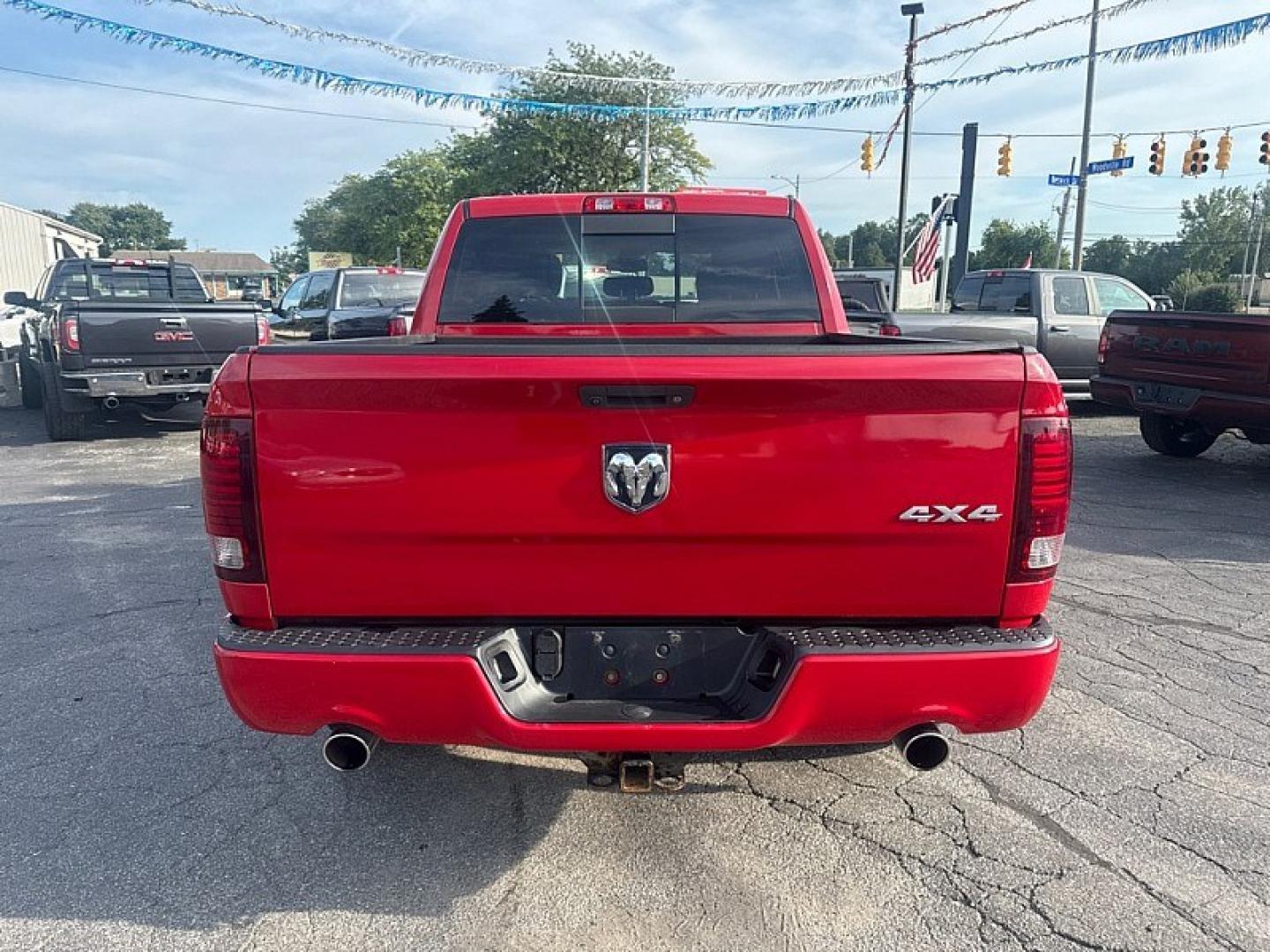 2015 RED /BLACK RAM 1500 Sport Crew Cab SWB 4WD (1C6RR7MT9FS) with an 5.7L V8 OHV 16V engine, 6-Speed Automatic transmission, located at 3304 Woodville Road, Northwood, OH, 43619, (419) 210-8019, 41.612694, -83.480743 - Your #1 Destination for Auto Loans and mdash;No Matter Your Credit!At our dealership, we believe everyone deserves the opportunity to drive their dream car and mdash;whether you have good credit, bad credit, or no credit at all. With a wide selection of hundreds of cars, trucks, and SUVs, you'll fin- Photo#3