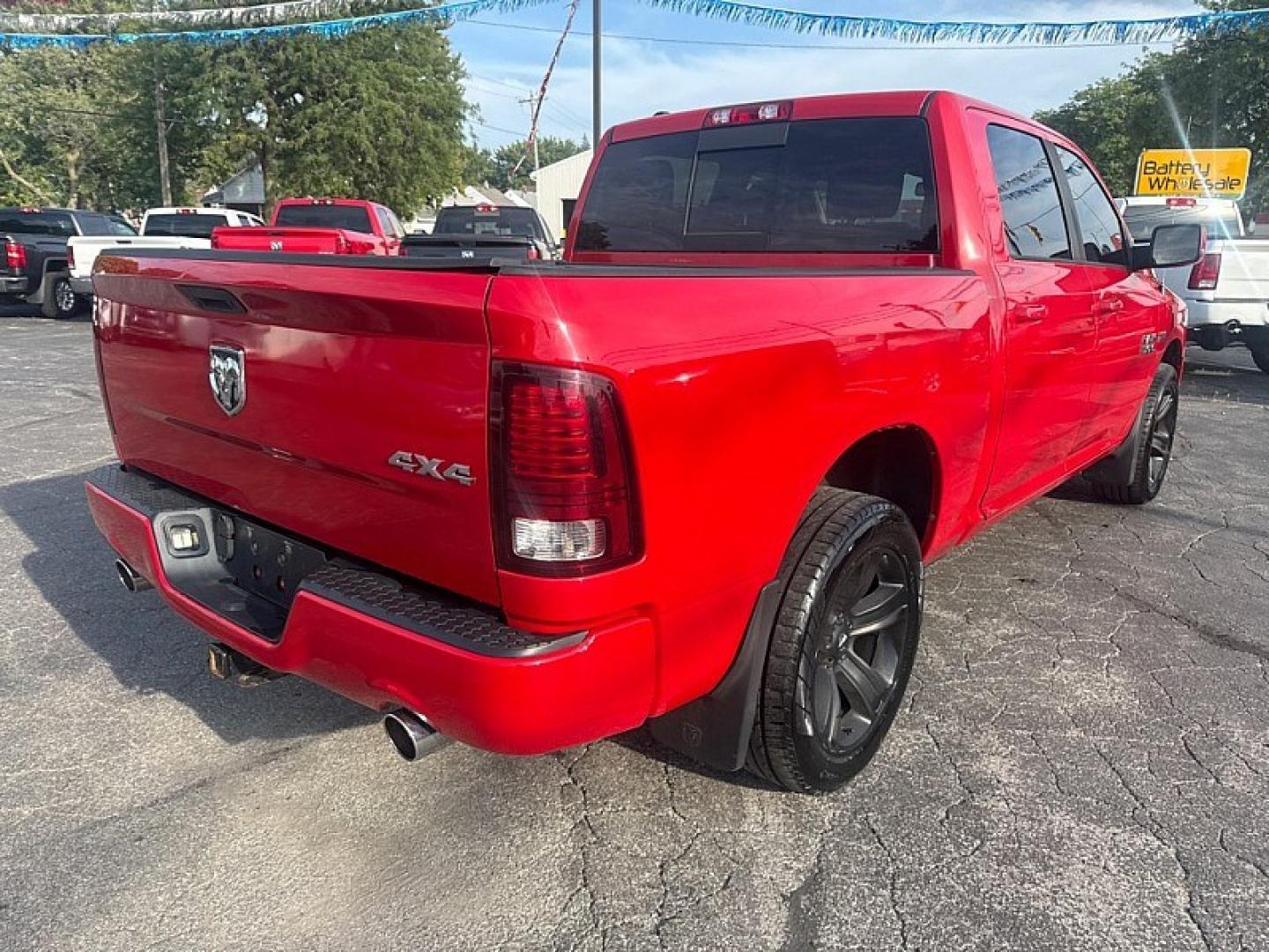 2015 RED /BLACK RAM 1500 Sport Crew Cab SWB 4WD (1C6RR7MT9FS) with an 5.7L V8 OHV 16V engine, 6-Speed Automatic transmission, located at 3304 Woodville Road, Northwood, OH, 43619, (419) 210-8019, 41.612694, -83.480743 - Your #1 Destination for Auto Loans and mdash;No Matter Your Credit!At our dealership, we believe everyone deserves the opportunity to drive their dream car and mdash;whether you have good credit, bad credit, or no credit at all. With a wide selection of hundreds of cars, trucks, and SUVs, you'll fin- Photo#4
