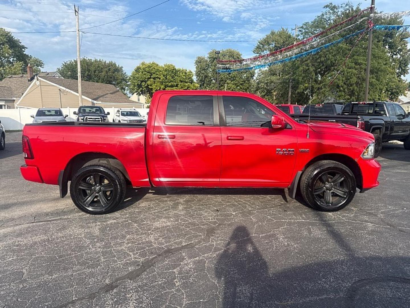 2015 RED /BLACK RAM 1500 Sport Crew Cab SWB 4WD (1C6RR7MT9FS) with an 5.7L V8 OHV 16V engine, 6-Speed Automatic transmission, located at 3304 Woodville Road, Northwood, OH, 43619, (419) 210-8019, 41.612694, -83.480743 - Your #1 Destination for Auto Loans and mdash;No Matter Your Credit!At our dealership, we believe everyone deserves the opportunity to drive their dream car and mdash;whether you have good credit, bad credit, or no credit at all. With a wide selection of hundreds of cars, trucks, and SUVs, you'll fin- Photo#5