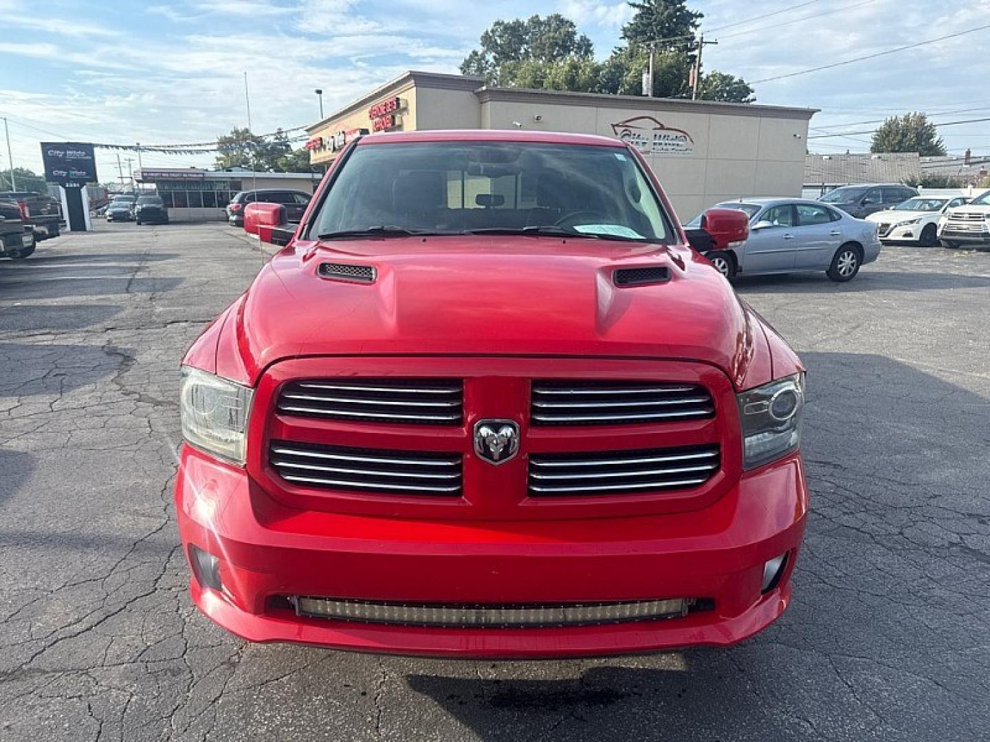 2015 RED /BLACK RAM 1500 Sport Crew Cab SWB 4WD (1C6RR7MT9FS) with an 5.7L V8 OHV 16V engine, 6-Speed Automatic transmission, located at 3304 Woodville Road, Northwood, OH, 43619, (419) 210-8019, 41.612694, -83.480743 - Your #1 Destination for Auto Loans and mdash;No Matter Your Credit!At our dealership, we believe everyone deserves the opportunity to drive their dream car and mdash;whether you have good credit, bad credit, or no credit at all. With a wide selection of hundreds of cars, trucks, and SUVs, you'll fin- Photo#7