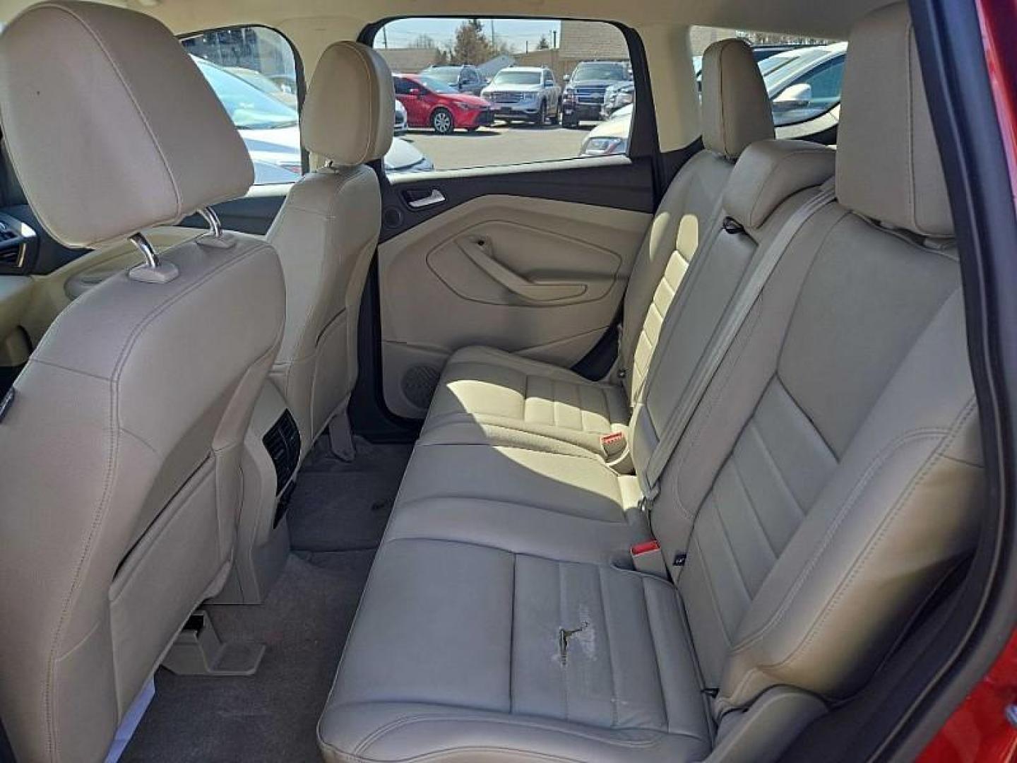 2014 ORANGE /TAN Ford Escape Titanium 4WD (1FMCU9J98EU) with an 2.0L L4 DOHC 16V engine, 6-Speed Automatic transmission, located at 3304 Woodville Road, Northwood, OH, 43619, (419) 210-8019, 41.612694, -83.480743 - Your #1 Destination for Auto Loans and mdash;No Matter Your Credit!At our dealership, we believe everyone deserves the opportunity to drive their dream car and mdash;whether you have good credit, bad credit, or no credit at all. With a wide selection of hundreds of cars, trucks, and SUVs, you'll fin - Photo#11