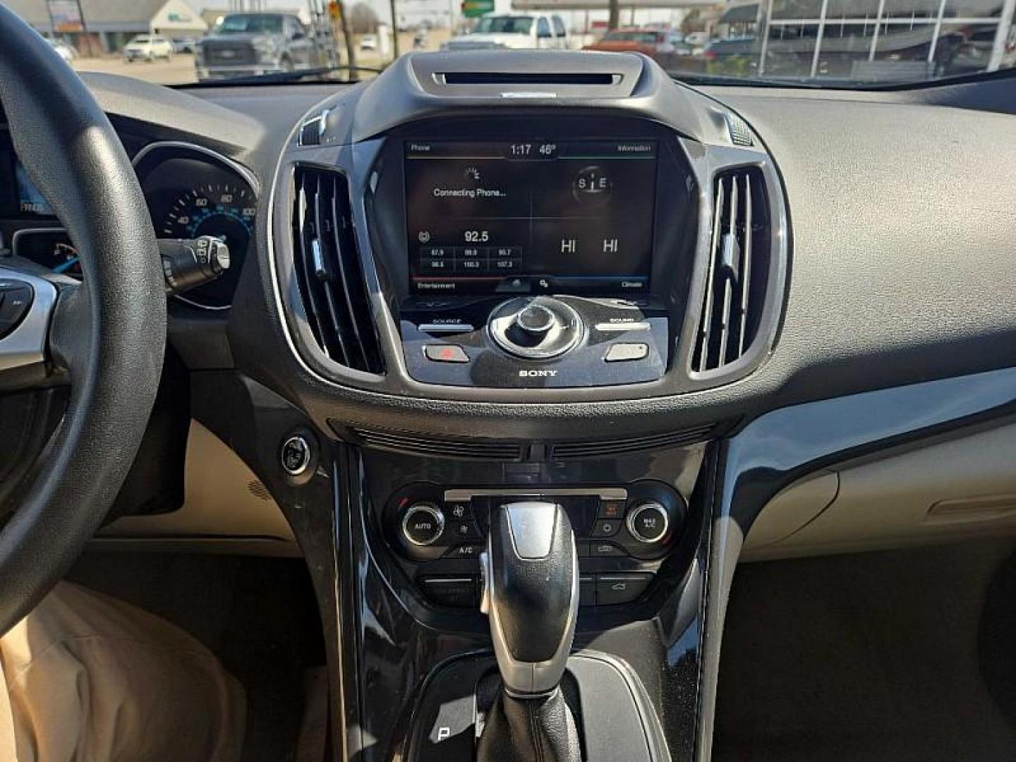 2014 ORANGE /TAN Ford Escape Titanium 4WD (1FMCU9J98EU) with an 2.0L L4 DOHC 16V engine, 6-Speed Automatic transmission, located at 3304 Woodville Road, Northwood, OH, 43619, (419) 210-8019, 41.612694, -83.480743 - Your #1 Destination for Auto Loans and mdash;No Matter Your Credit!At our dealership, we believe everyone deserves the opportunity to drive their dream car and mdash;whether you have good credit, bad credit, or no credit at all. With a wide selection of hundreds of cars, trucks, and SUVs, you'll fin - Photo#17