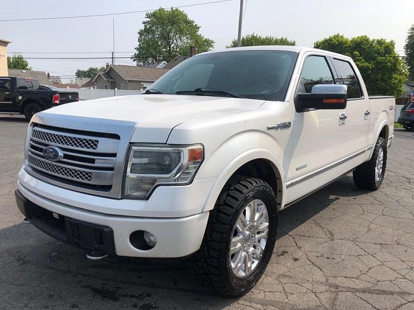 2014 WHITE /BROWN Ford F-150 FX4 SuperCrew 5.5-ft. Bed 4WD (1FTFW1ET1EF) with an 3.5L V6 TURBO engine, 6-Speed Automatic transmission, located at 3304 Woodville Road, Northwood, OH, 43619, (419) 210-8019, 41.612694, -83.480743 - Your #1 Destination for Auto Loans and mdash;No Matter Your Credit!At our dealership, we believe everyone deserves the opportunity to drive their dream car and mdash;whether you have good credit, bad credit, or no credit at all. With a wide selection of hundreds of cars, trucks, and SUVs, you'll fin - Photo#0