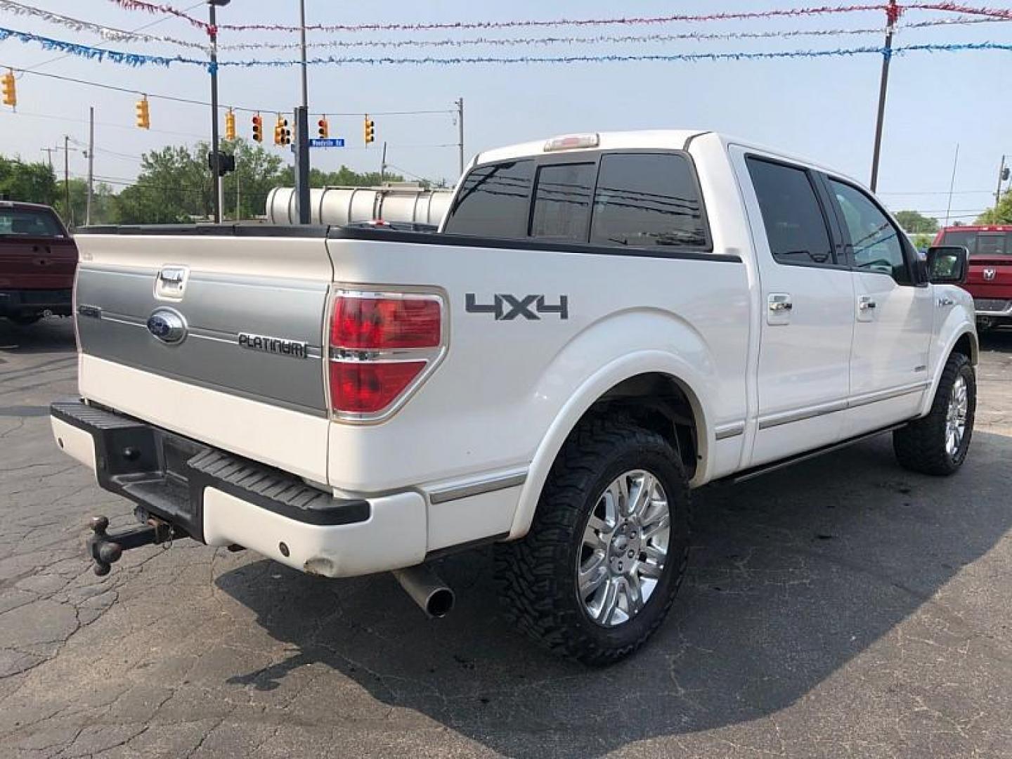 2014 WHITE /BROWN Ford F-150 FX4 SuperCrew 5.5-ft. Bed 4WD (1FTFW1ET1EF) with an 3.5L V6 TURBO engine, 6-Speed Automatic transmission, located at 3304 Woodville Road, Northwood, OH, 43619, (419) 210-8019, 41.612694, -83.480743 - Your #1 Destination for Auto Loans and mdash;No Matter Your Credit!At our dealership, we believe everyone deserves the opportunity to drive their dream car and mdash;whether you have good credit, bad credit, or no credit at all. With a wide selection of hundreds of cars, trucks, and SUVs, you'll fin - Photo#4