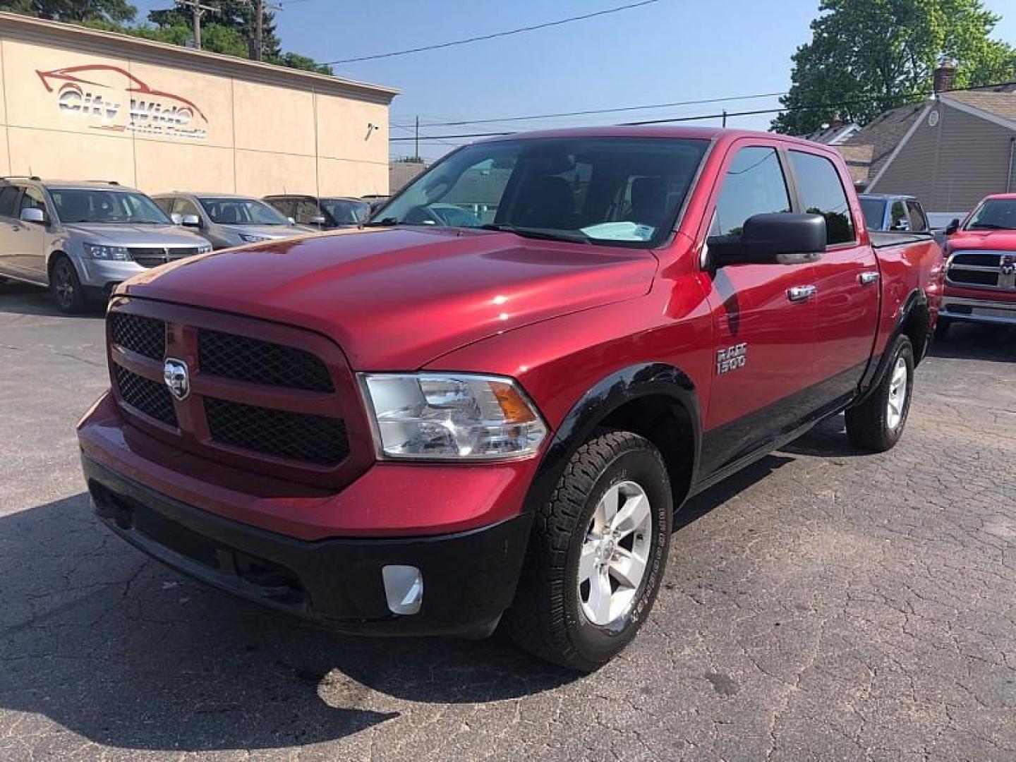 2014 RED /GRAY RAM 1500 SLT Crew Cab SWB 4WD (1C6RR7LG0ES) with an 3.6L V6 DOHC 24V FFV engine, 6-Speed Automatic transmission, located at 3304 Woodville Road, Northwood, OH, 43619, (419) 210-8019, 41.612694, -83.480743 - Your #1 Destination for Auto Loans and mdash;No Matter Your Credit!At our dealership, we believe everyone deserves the opportunity to drive their dream car and mdash;whether you have good credit, bad credit, or no credit at all. With a wide selection of hundreds of cars, trucks, and SUVs, you'll fin - Photo#0