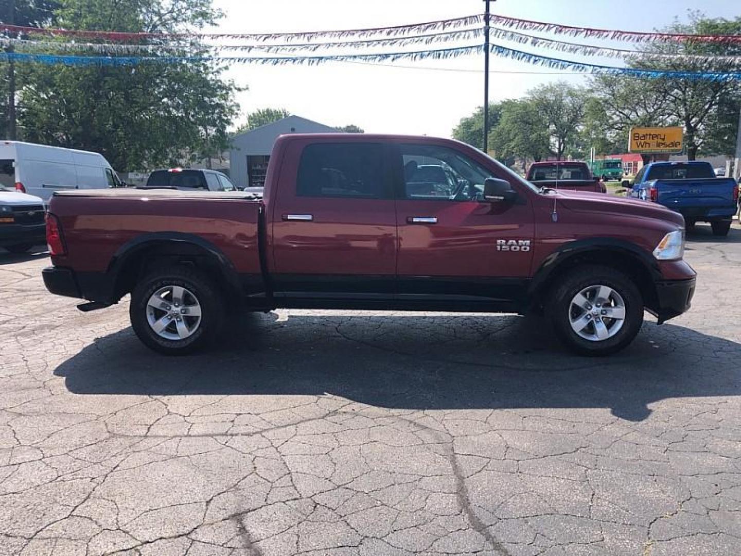 2014 RED /GRAY RAM 1500 SLT Crew Cab SWB 4WD (1C6RR7LG0ES) with an 3.6L V6 DOHC 24V FFV engine, 6-Speed Automatic transmission, located at 3304 Woodville Road, Northwood, OH, 43619, (419) 210-8019, 41.612694, -83.480743 - Your #1 Destination for Auto Loans and mdash;No Matter Your Credit!At our dealership, we believe everyone deserves the opportunity to drive their dream car and mdash;whether you have good credit, bad credit, or no credit at all. With a wide selection of hundreds of cars, trucks, and SUVs, you'll fin - Photo#5