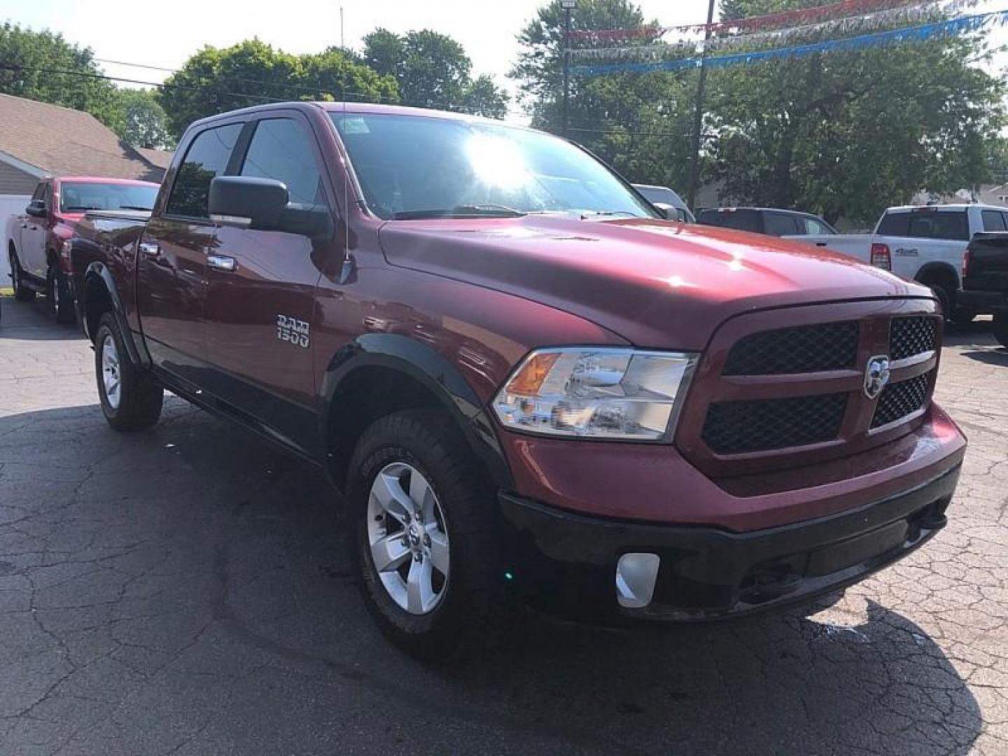 2014 RED /GRAY RAM 1500 SLT Crew Cab SWB 4WD (1C6RR7LG0ES) with an 3.6L V6 DOHC 24V FFV engine, 6-Speed Automatic transmission, located at 3304 Woodville Road, Northwood, OH, 43619, (419) 210-8019, 41.612694, -83.480743 - Your #1 Destination for Auto Loans and mdash;No Matter Your Credit!At our dealership, we believe everyone deserves the opportunity to drive their dream car and mdash;whether you have good credit, bad credit, or no credit at all. With a wide selection of hundreds of cars, trucks, and SUVs, you'll fin - Photo#6