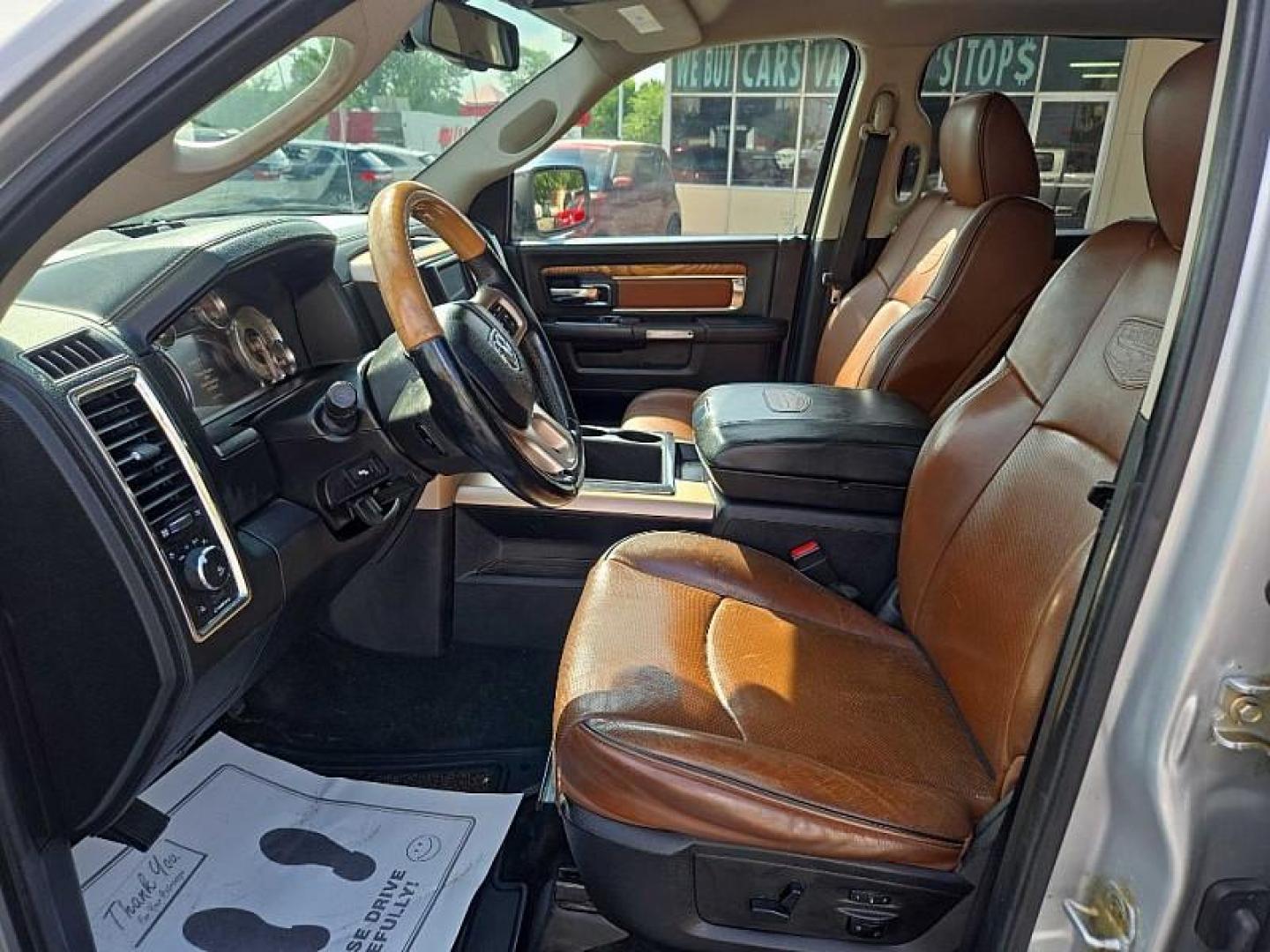 2014 SILVER /BROWN RAM 1500 Laramie Longhorn Edition Crew Cab LWB 4WD (1C6RR7WTXES) with an 5.7L V8 OHV 16V engine, 6-Speed Automatic transmission, located at 3304 Woodville Road, Northwood, OH, 43619, (419) 210-8019, 41.612694, -83.480743 - Your #1 Destination for Auto Loans and mdash;No Matter Your Credit!At our dealership, we believe everyone deserves the opportunity to drive their dream car and mdash;whether you have good credit, bad credit, or no credit at all. With a wide selection of hundreds of cars, trucks, and SUVs, you'll fin - Photo#9