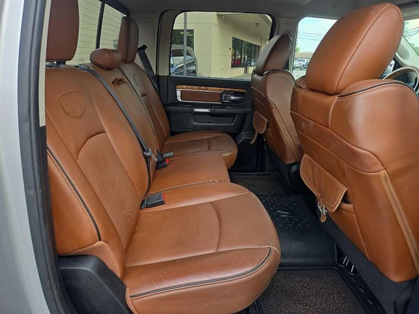 2014 SILVER /BROWN RAM 1500 Laramie Longhorn Edition Crew Cab LWB 4WD (1C6RR7WTXES) with an 5.7L V8 OHV 16V engine, 6-Speed Automatic transmission, located at 3304 Woodville Road, Northwood, OH, 43619, (419) 210-8019, 41.612694, -83.480743 - Your #1 Destination for Auto Loans and mdash;No Matter Your Credit!At our dealership, we believe everyone deserves the opportunity to drive their dream car and mdash;whether you have good credit, bad credit, or no credit at all. With a wide selection of hundreds of cars, trucks, and SUVs, you'll fin - Photo#16