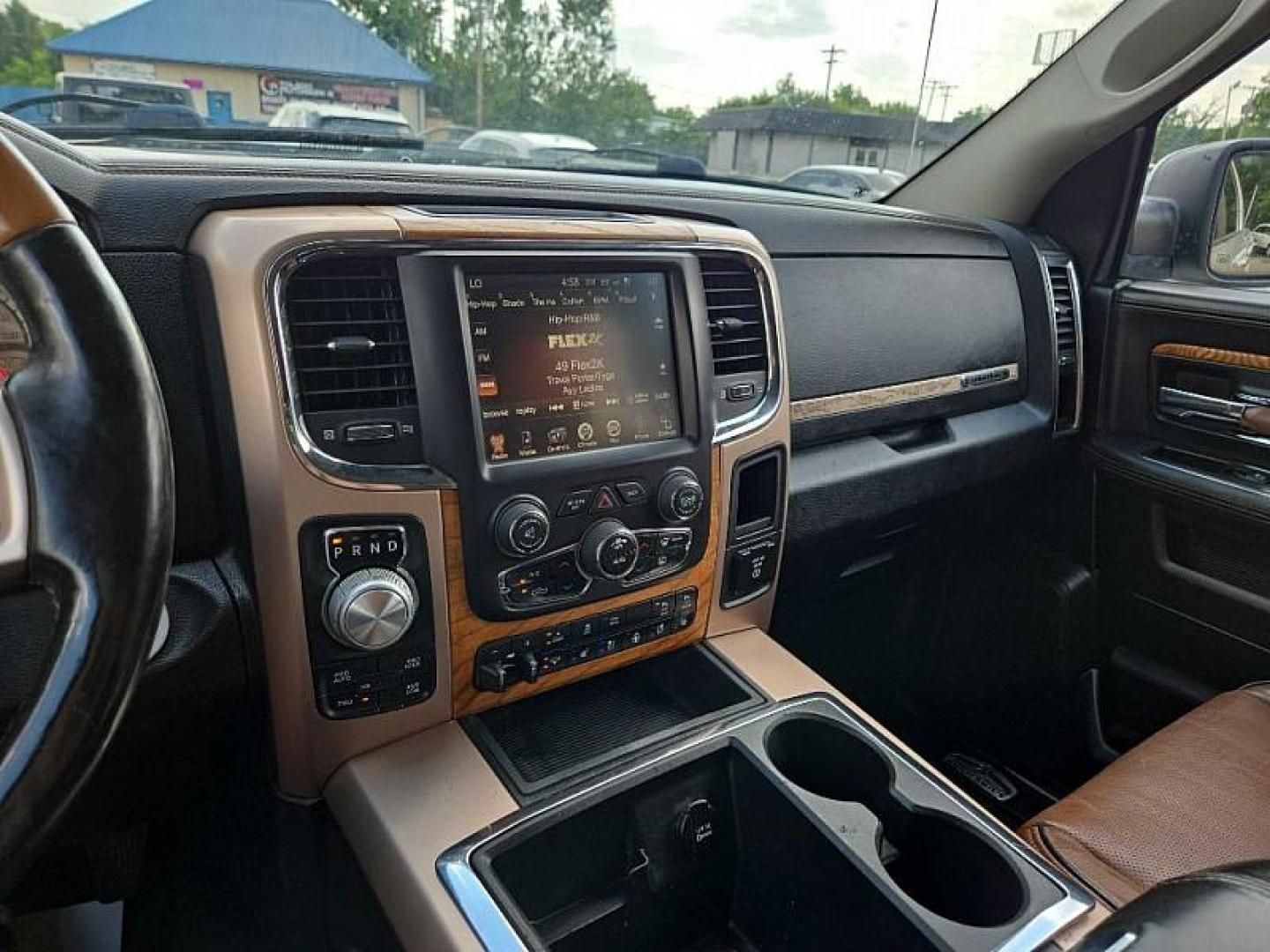 2014 SILVER /BROWN RAM 1500 Laramie Longhorn Edition Crew Cab LWB 4WD (1C6RR7WTXES) with an 5.7L V8 OHV 16V engine, 6-Speed Automatic transmission, located at 3304 Woodville Road, Northwood, OH, 43619, (419) 210-8019, 41.612694, -83.480743 - Your #1 Destination for Auto Loans and mdash;No Matter Your Credit!At our dealership, we believe everyone deserves the opportunity to drive their dream car and mdash;whether you have good credit, bad credit, or no credit at all. With a wide selection of hundreds of cars, trucks, and SUVs, you'll fin - Photo#23
