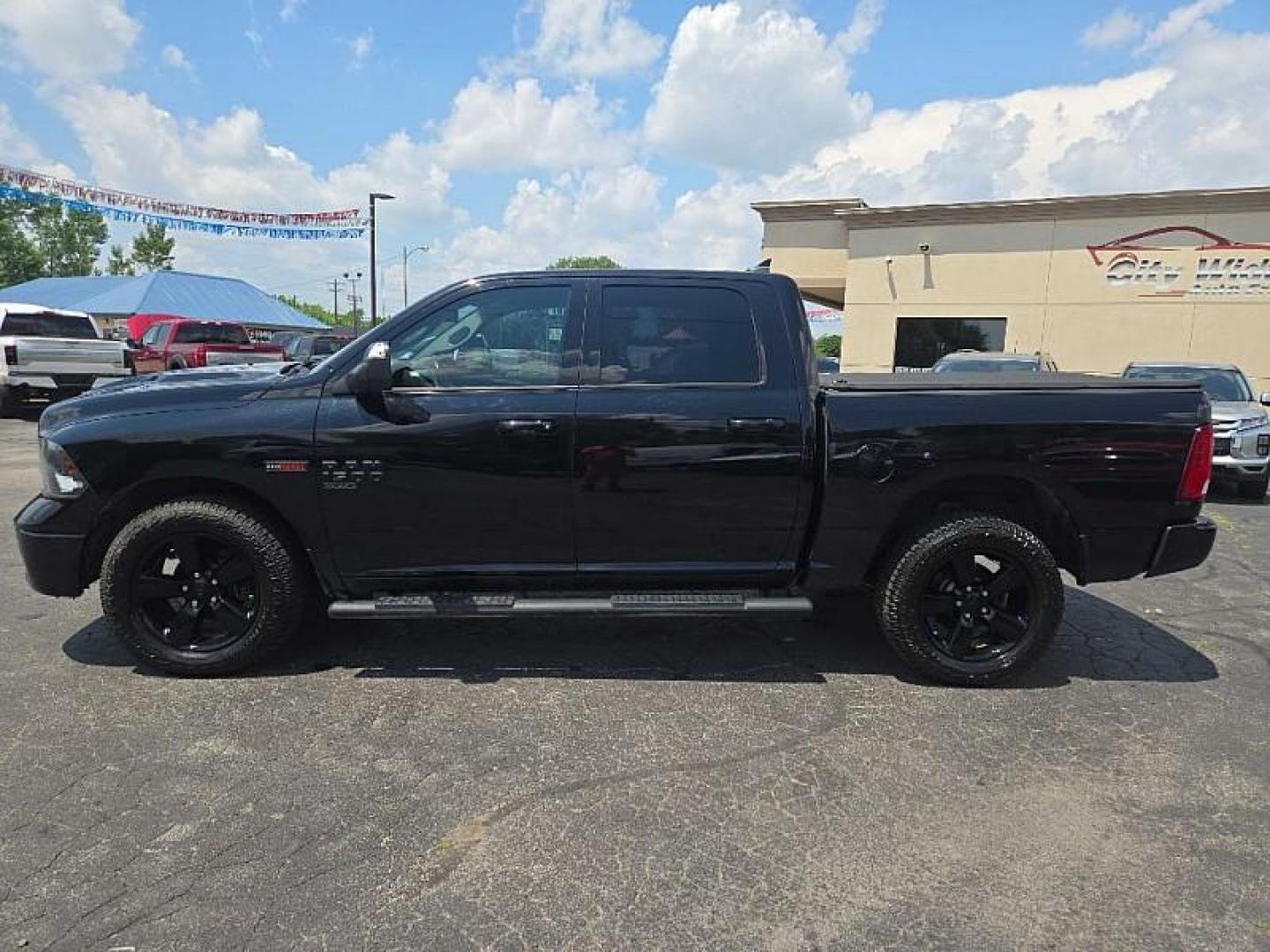 2019 BLACK /BLACK RAM 1500 SLT Crew Cab SWB 4WD (1C6RR7LM6KS) with an 3.0L V6 DIESEL engine, 8A transmission, located at 3304 Woodville Road, Northwood, OH, 43619, (419) 210-8019, 41.612694, -83.480743 - Your #1 Destination for Auto Loans and mdash;No Matter Your Credit!At our dealership, we believe everyone deserves the opportunity to drive their dream car and mdash;whether you have good credit, bad credit, or no credit at all. With a wide selection of hundreds of cars, trucks, and SUVs, you'll fin - Photo#2