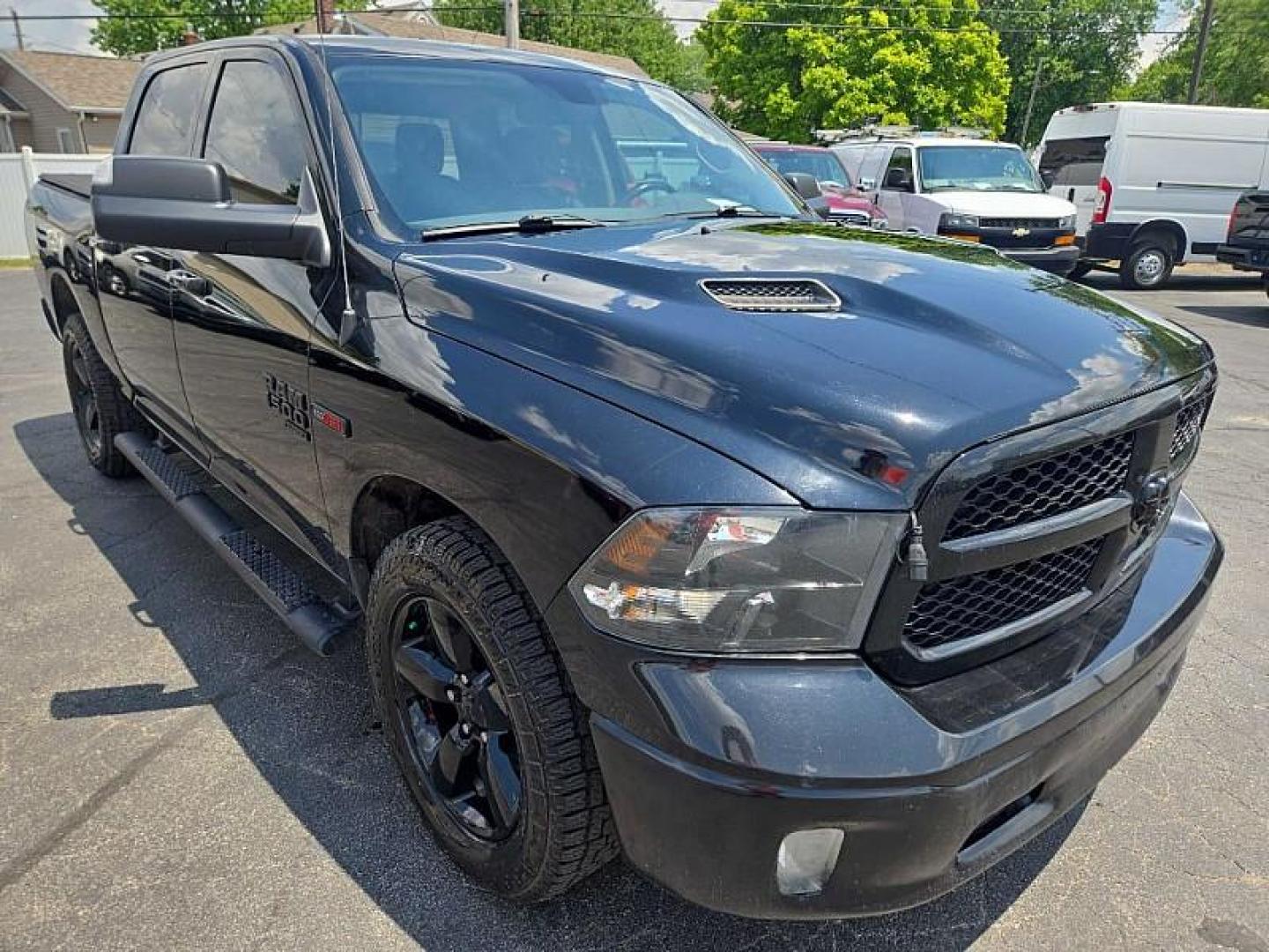 2019 BLACK /BLACK RAM 1500 SLT Crew Cab SWB 4WD (1C6RR7LM6KS) with an 3.0L V6 DIESEL engine, 8A transmission, located at 3304 Woodville Road, Northwood, OH, 43619, (419) 210-8019, 41.612694, -83.480743 - Your #1 Destination for Auto Loans and mdash;No Matter Your Credit!At our dealership, we believe everyone deserves the opportunity to drive their dream car and mdash;whether you have good credit, bad credit, or no credit at all. With a wide selection of hundreds of cars, trucks, and SUVs, you'll fin - Photo#4