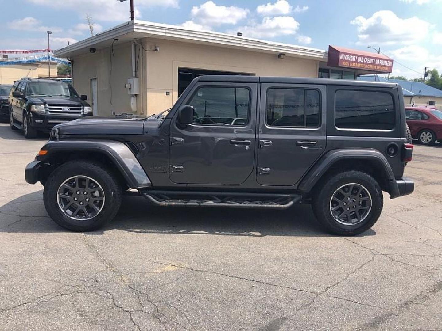 2021 GRAY /BLACK Jeep Wrangler Unlimited Sport (1C4HJXDNXMW) with an 2.0L L4 DOHC 16V TURBO engine, 6M transmission, located at 3304 Woodville Road, Northwood, OH, 43619, (419) 210-8019, 41.612694, -83.480743 - Your #1 Destination for Auto Loans and mdash;No Matter Your Credit!At our dealership, we believe everyone deserves the opportunity to drive their dream car and mdash;whether you have good credit, bad credit, or no credit at all. With a wide selection of hundreds of cars, trucks, and SUVs, you'll fin - Photo#1