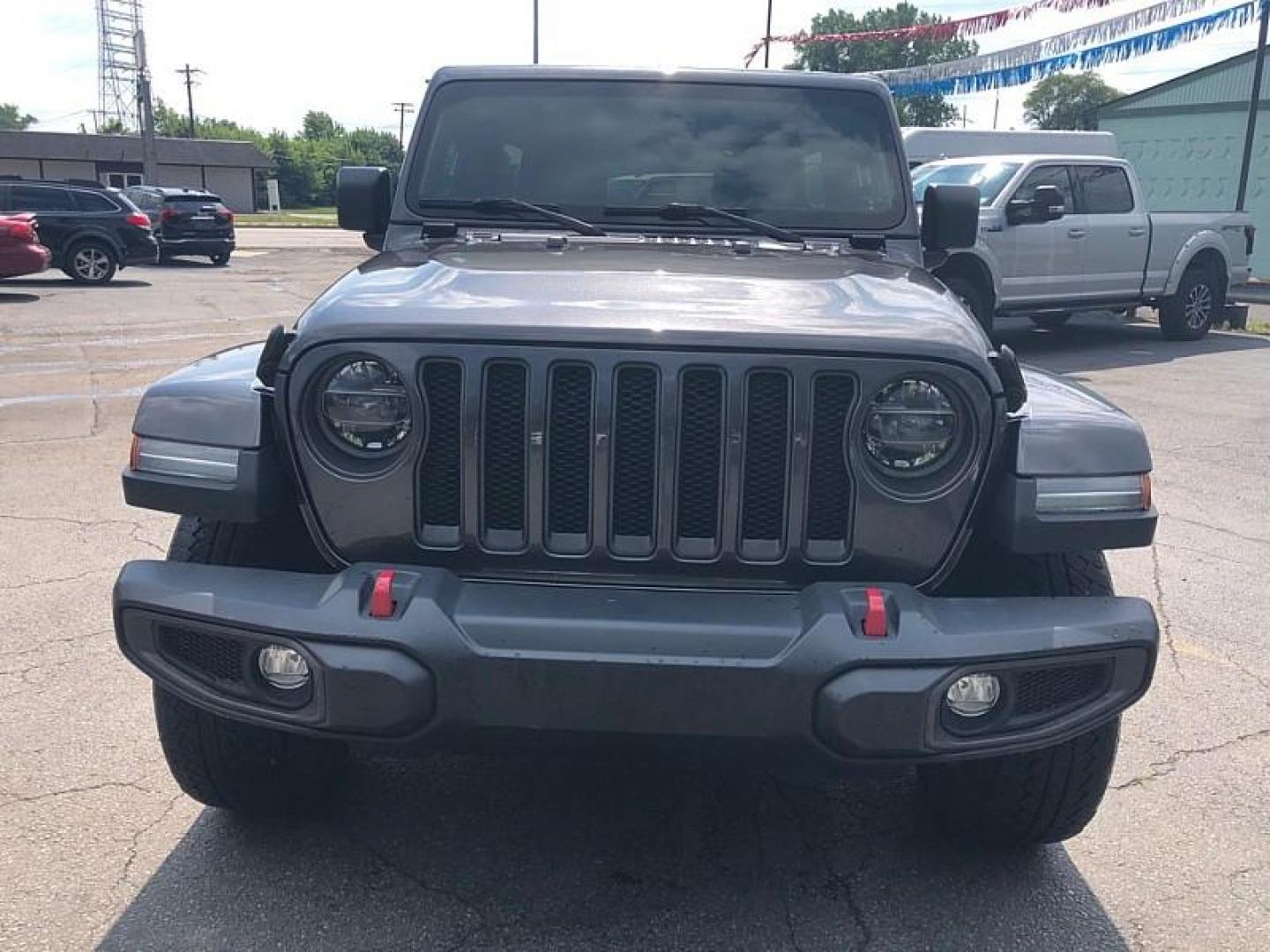 2021 GRAY /BLACK Jeep Wrangler Unlimited Sport (1C4HJXDNXMW) with an 2.0L L4 DOHC 16V TURBO engine, 6M transmission, located at 3304 Woodville Road, Northwood, OH, 43619, (419) 210-8019, 41.612694, -83.480743 - Your #1 Destination for Auto Loans and mdash;No Matter Your Credit!At our dealership, we believe everyone deserves the opportunity to drive their dream car and mdash;whether you have good credit, bad credit, or no credit at all. With a wide selection of hundreds of cars, trucks, and SUVs, you'll fin - Photo#7