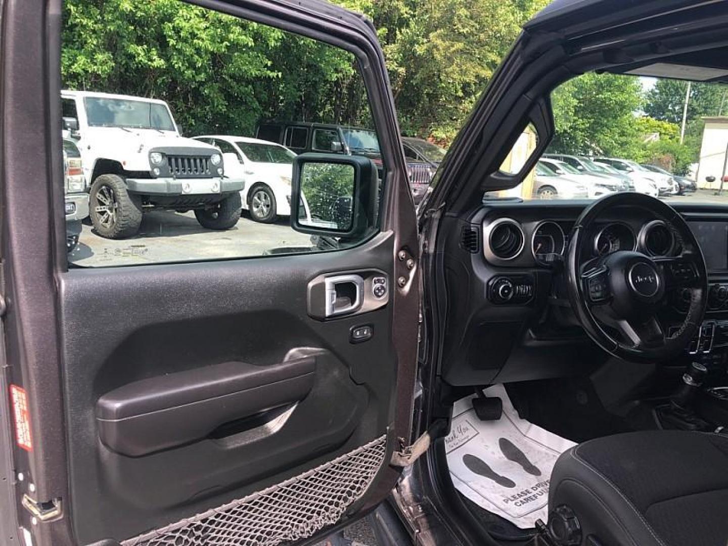 2021 GRAY /BLACK Jeep Wrangler Unlimited Sport (1C4HJXDNXMW) with an 2.0L L4 DOHC 16V TURBO engine, 6M transmission, located at 3304 Woodville Road, Northwood, OH, 43619, (419) 210-8019, 41.612694, -83.480743 - Your #1 Destination for Auto Loans and mdash;No Matter Your Credit!At our dealership, we believe everyone deserves the opportunity to drive their dream car and mdash;whether you have good credit, bad credit, or no credit at all. With a wide selection of hundreds of cars, trucks, and SUVs, you'll fin - Photo#8