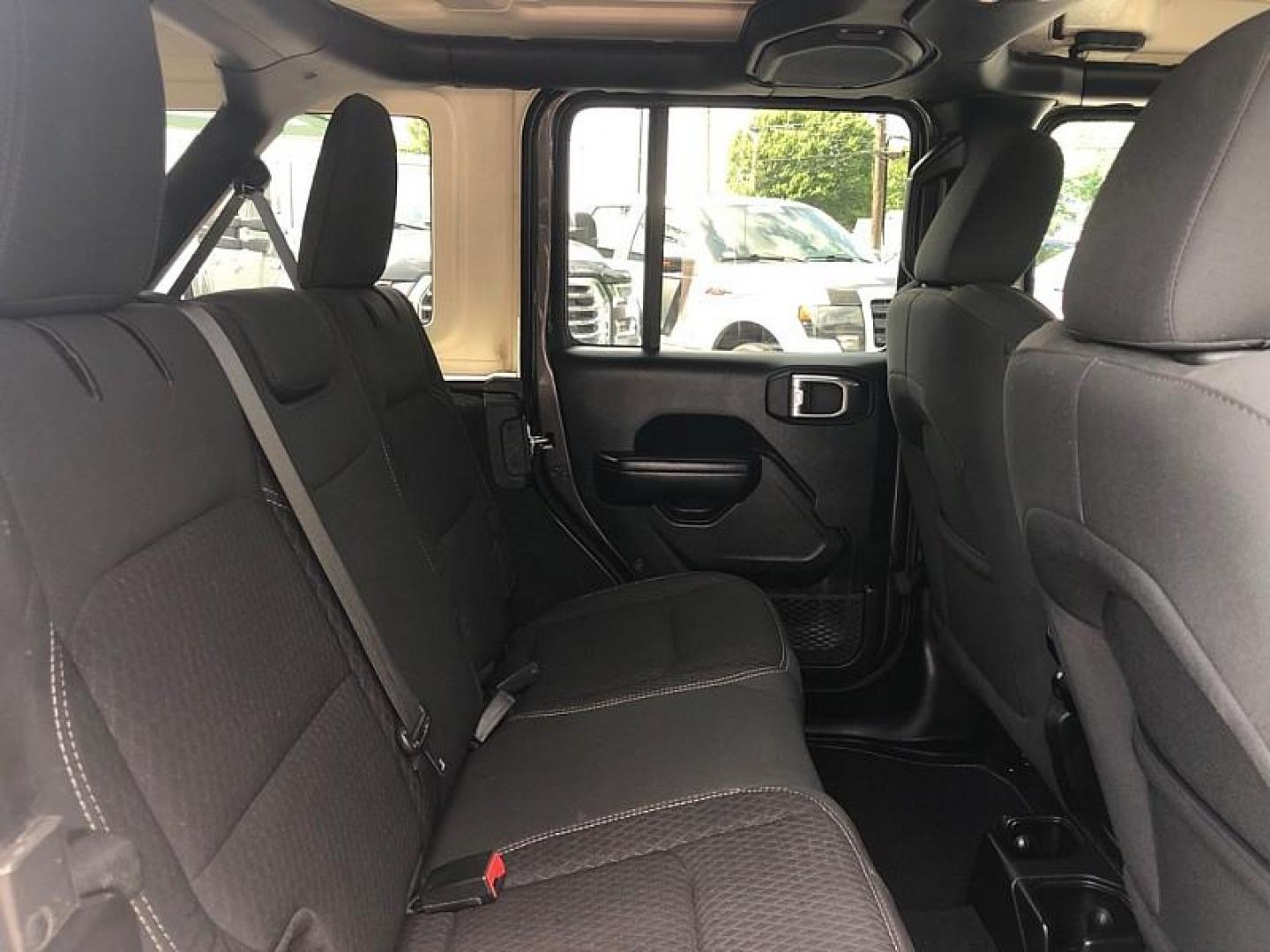 2021 GRAY /BLACK Jeep Wrangler Unlimited Sport (1C4HJXDNXMW) with an 2.0L L4 DOHC 16V TURBO engine, 6M transmission, located at 3304 Woodville Road, Northwood, OH, 43619, (419) 210-8019, 41.612694, -83.480743 - Your #1 Destination for Auto Loans and mdash;No Matter Your Credit!At our dealership, we believe everyone deserves the opportunity to drive their dream car and mdash;whether you have good credit, bad credit, or no credit at all. With a wide selection of hundreds of cars, trucks, and SUVs, you'll fin - Photo#14