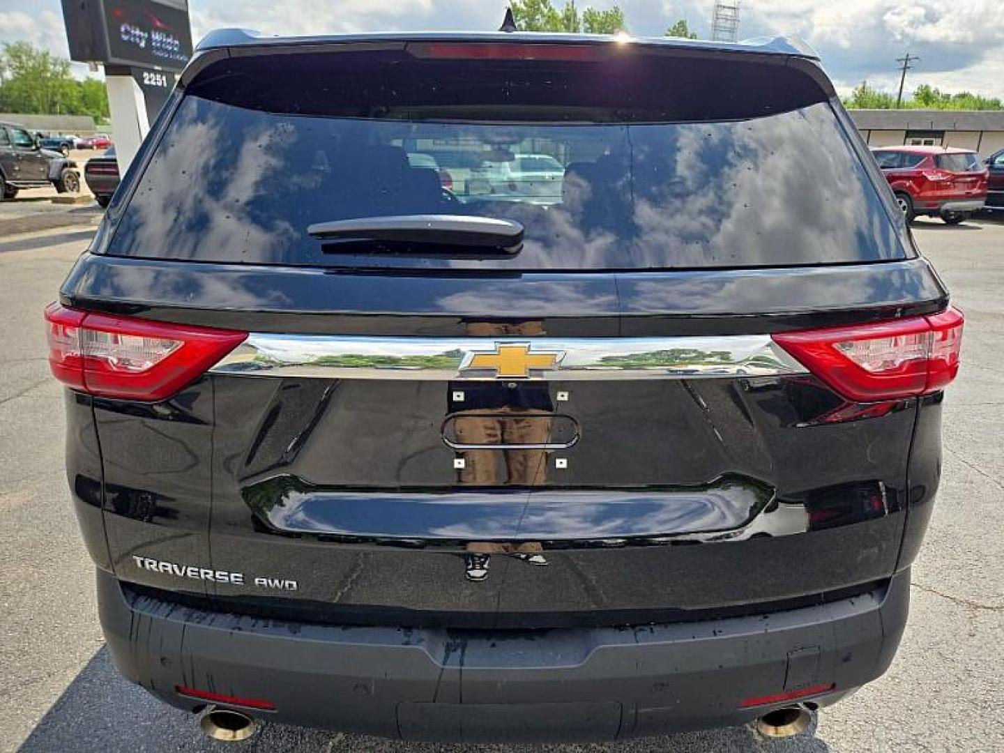 2021 BLACK /BLACK Chevrolet Traverse LS FL AWD (1GNEVLKW5MJ) with an 3.6L V6 DOHC 24V engine, 9A transmission, located at 3304 Woodville Road, Northwood, OH, 43619, (419) 210-8019, 41.612694, -83.480743 - Your #1 Destination for Auto Loans and mdash;No Matter Your Credit!At our dealership, we believe everyone deserves the opportunity to drive their dream car and mdash;whether you have good credit, bad credit, or no credit at all. With a wide selection of hundreds of cars, trucks, and SUVs, you'll fin - Photo#3