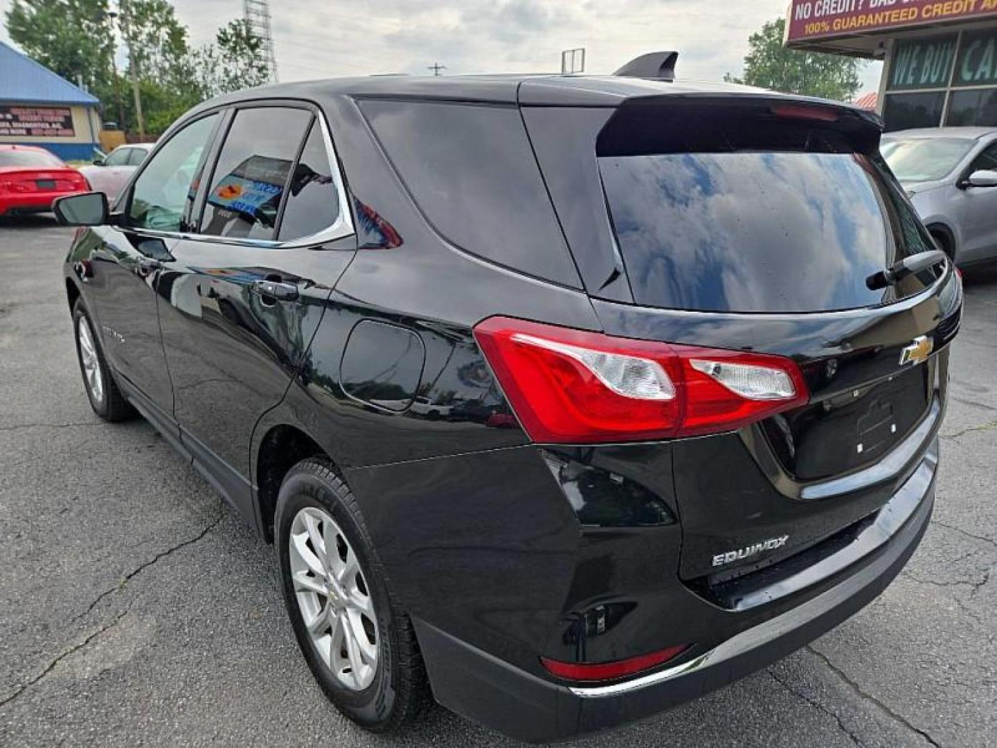 2019 BLACK /BLACK Chevrolet Equinox LT AWD (2GNAXUEV6K6) with an 1.5L L4 DOHC 16V TURBO engine, 6A transmission, located at 3304 Woodville Road, Northwood, OH, 43619, (419) 210-8019, 41.612694, -83.480743 - Your #1 Destination for Auto Loans and mdash;No Matter Your Credit!At our dealership, we believe everyone deserves the opportunity to drive their dream car and mdash;whether you have good credit, bad credit, or no credit at all. With a wide selection of hundreds of cars, trucks, and SUVs, you'll fin - Photo#2
