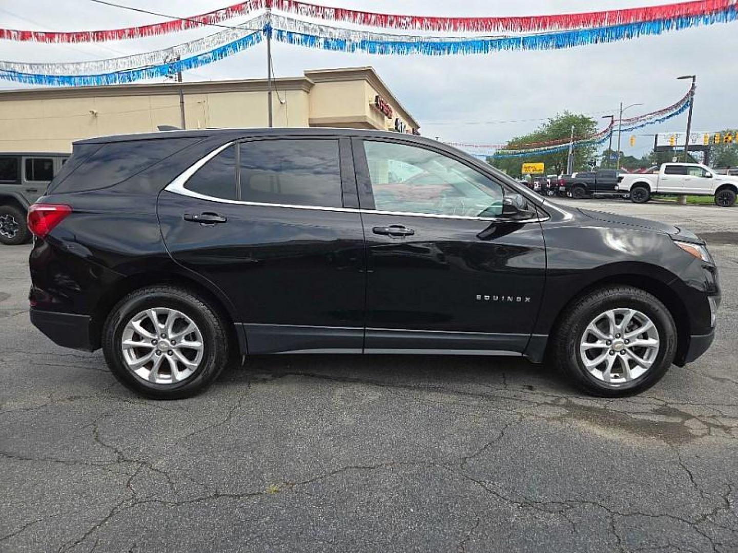 2019 BLACK /BLACK Chevrolet Equinox LT AWD (2GNAXUEV6K6) with an 1.5L L4 DOHC 16V TURBO engine, 6A transmission, located at 3304 Woodville Road, Northwood, OH, 43619, (419) 210-8019, 41.612694, -83.480743 - Your #1 Destination for Auto Loans and mdash;No Matter Your Credit!At our dealership, we believe everyone deserves the opportunity to drive their dream car and mdash;whether you have good credit, bad credit, or no credit at all. With a wide selection of hundreds of cars, trucks, and SUVs, you'll fin - Photo#5