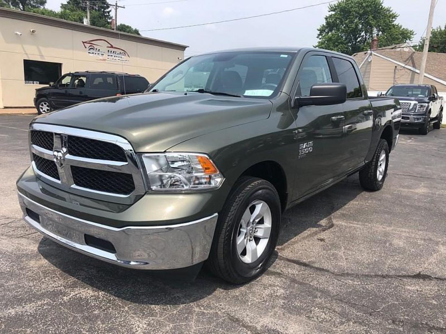 2021 GREEN /GRAY RAM 1500 Classic Tradesman Crew Cab SWB 4WD (1C6RR7LG3MS) with an 3.6L V6 DOHC 24V FFV engine, 8A transmission, located at 3304 Woodville Road, Northwood, OH, 43619, (419) 210-8019, 41.612694, -83.480743 - Your #1 Destination for Auto Loans and mdash;No Matter Your Credit!At our dealership, we believe everyone deserves the opportunity to drive their dream car and mdash;whether you have good credit, bad credit, or no credit at all. With a wide selection of hundreds of cars, trucks, and SUVs, you'll fin - Photo#0