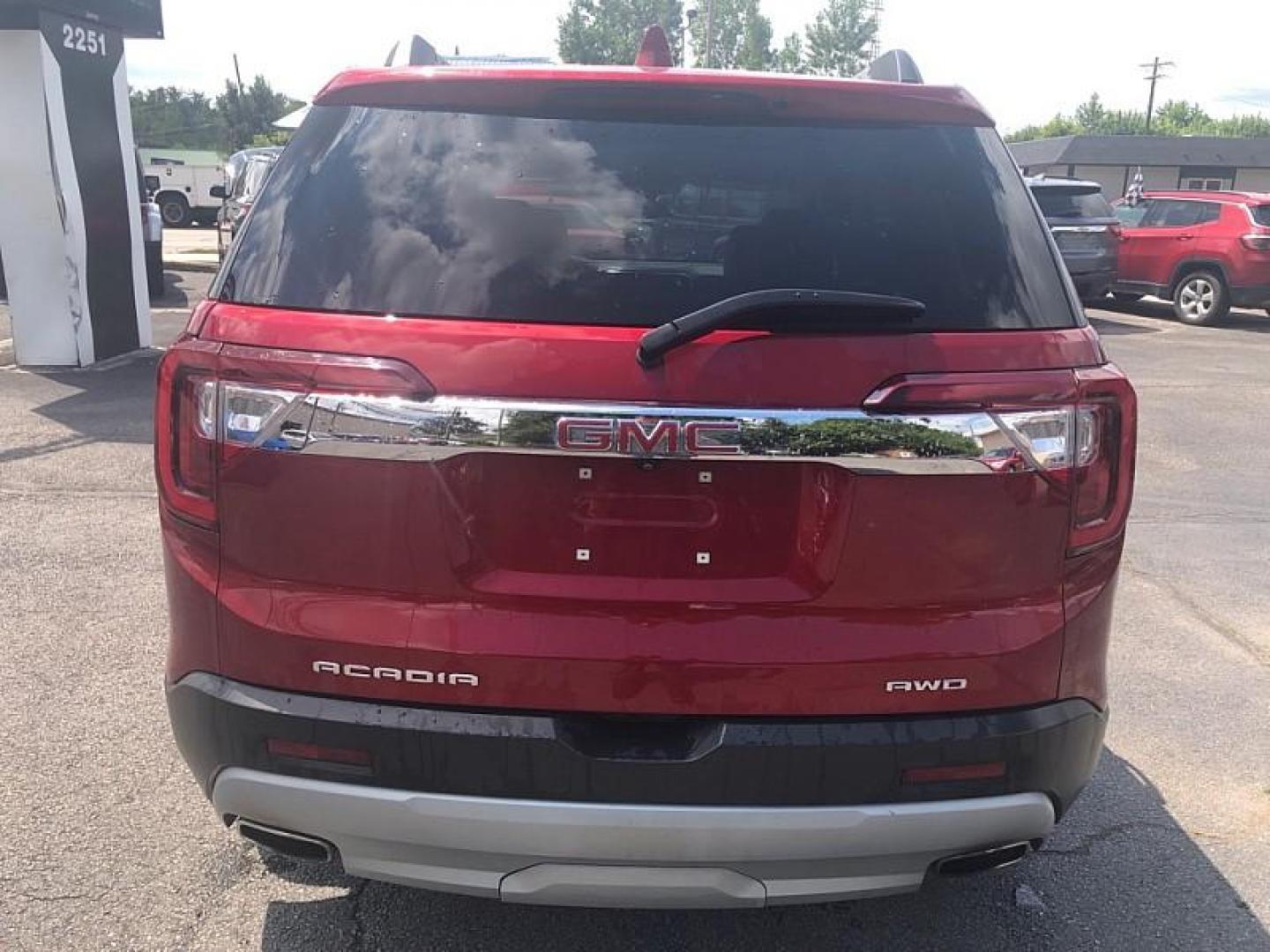 2023 RED /GRAY GMC Acadia SLT AWD (1GKKNUL47PZ) with an 2.0L L4 DOHC 16V TURBO engine, 9A transmission, located at 3304 Woodville Road, Northwood, OH, 43619, (419) 210-8019, 41.612694, -83.480743 - Your #1 Destination for Auto Loans and mdash;No Matter Your Credit!At our dealership, we believe everyone deserves the opportunity to drive their dream car and mdash;whether you have good credit, bad credit, or no credit at all. With a wide selection of hundreds of cars, trucks, and SUVs, you'll fin - Photo#3