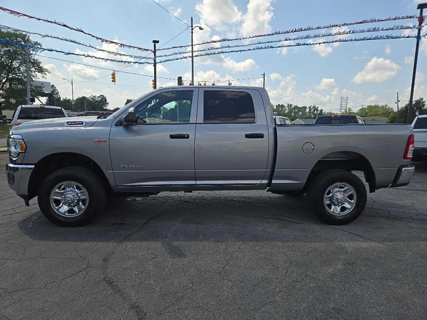 2022 SILVER /BLACK RAM 2500 Tradesman Crew Cab SWB 4WD (3C6UR5CJ2NG) with an 6.4L V8 engine, 6A transmission, located at 3304 Woodville Road, Northwood, OH, 43619, (419) 210-8019, 41.612694, -83.480743 - Your #1 Destination for Auto Loans and mdash;No Matter Your Credit!At our dealership, we believe everyone deserves the opportunity to drive their dream car and mdash;whether you have good credit, bad credit, or no credit at all. With a wide selection of hundreds of cars, trucks, and SUVs, you'll fin - Photo#1