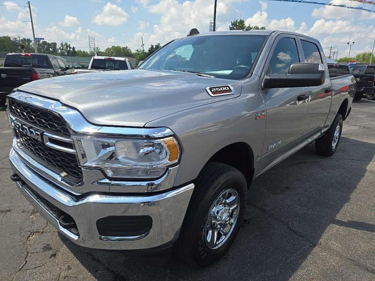 2022 SILVER /BLACK RAM 2500 Tradesman Crew Cab SWB 4WD (3C6UR5CJ2NG) with an 6.4L V8 engine, 6A transmission, located at 3304 Woodville Road, Northwood, OH, 43619, (419) 210-8019, 41.612694, -83.480743 - Your #1 Destination for Auto Loans and mdash;No Matter Your Credit!At our dealership, we believe everyone deserves the opportunity to drive their dream car and mdash;whether you have good credit, bad credit, or no credit at all. With a wide selection of hundreds of cars, trucks, and SUVs, you'll fin - Photo#0