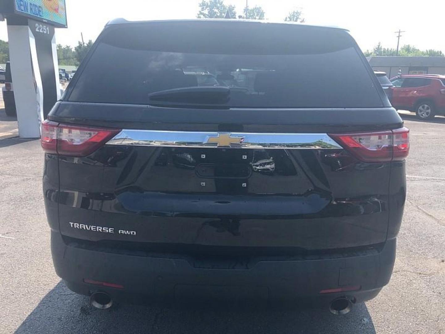 2021 BLACK /BLACK Chevrolet Traverse LS FL AWD (1GNEVLKW3MJ) with an 3.6L V6 DOHC 24V engine, 9A transmission, located at 3304 Woodville Road, Northwood, OH, 43619, (419) 210-8019, 41.612694, -83.480743 - Your #1 Destination for Auto Loans and mdash;No Matter Your Credit!At our dealership, we believe everyone deserves the opportunity to drive their dream car and mdash;whether you have good credit, bad credit, or no credit at all. With a wide selection of hundreds of cars, trucks, and SUVs, you'll fin - Photo#3