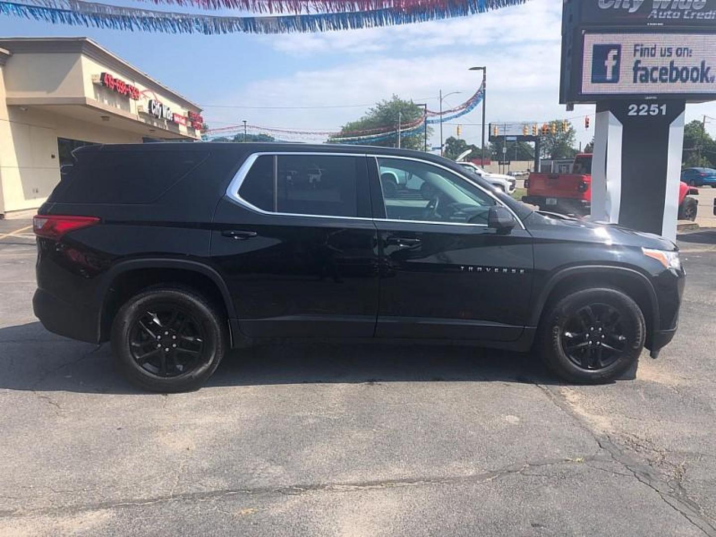 2021 BLACK /BLACK Chevrolet Traverse LS FL AWD (1GNEVLKW3MJ) with an 3.6L V6 DOHC 24V engine, 9A transmission, located at 3304 Woodville Road, Northwood, OH, 43619, (419) 210-8019, 41.612694, -83.480743 - Your #1 Destination for Auto Loans and mdash;No Matter Your Credit!At our dealership, we believe everyone deserves the opportunity to drive their dream car and mdash;whether you have good credit, bad credit, or no credit at all. With a wide selection of hundreds of cars, trucks, and SUVs, you'll fin - Photo#5