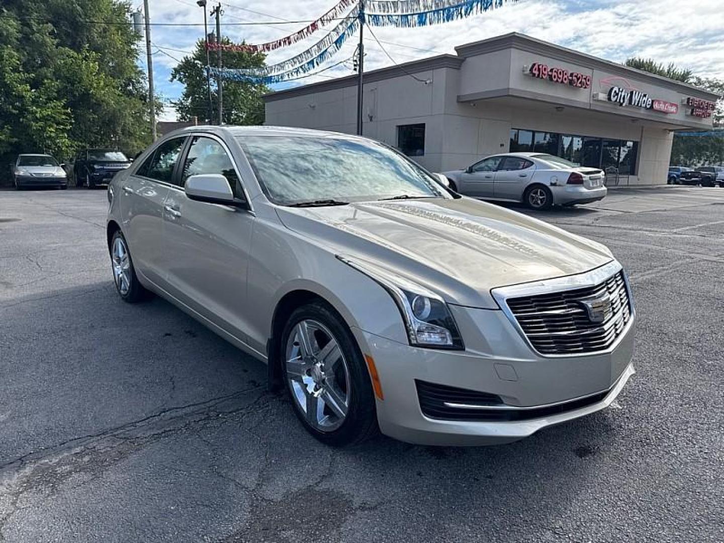 2015 GOLD /BLACK Cadillac ATS 2.0L Turbo Standard AWD (1G6AG5RX7F0) with an 2.0L L4 DOHC 16V TURBO engine, 6-Speed Automatic transmission, located at 3304 Woodville Road, Northwood, OH, 43619, (419) 210-8019, 41.612694, -83.480743 - Your #1 Destination for Auto Loans and mdash;No Matter Your Credit!At our dealership, we believe everyone deserves the opportunity to drive their dream car and mdash;whether you have good credit, bad credit, or no credit at all. With a wide selection of hundreds of cars, trucks, and SUVs, you'll fin - Photo#6