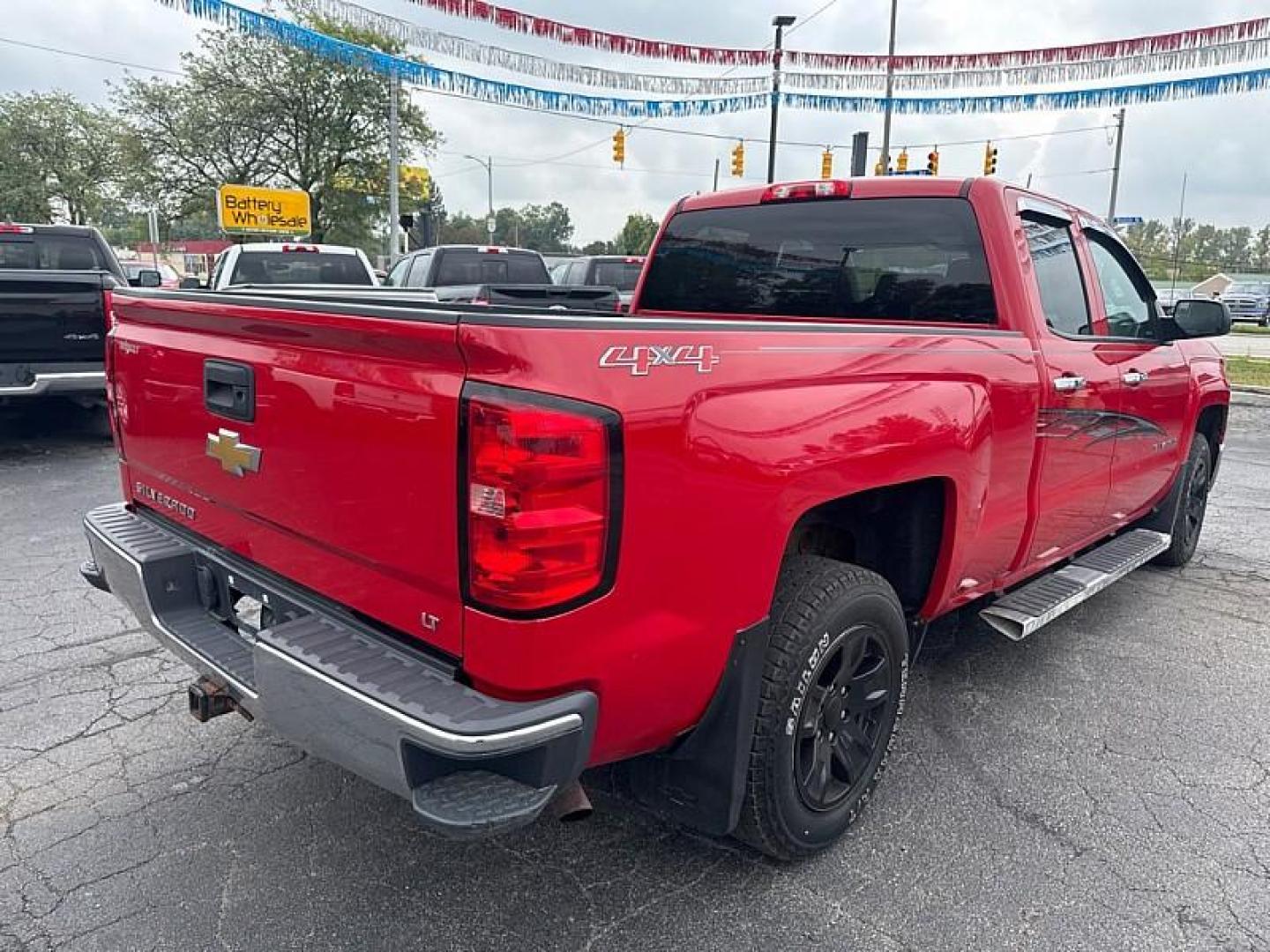 2014 RED /BLACK Chevrolet Silverado 1500 1LT Double Cab 4WD (1GCVKREC7EZ) with an 5.3L V8 OHV 16V engine, 6-Speed Automatic transmission, located at 3304 Woodville Road, Northwood, OH, 43619, (419) 210-8019, 41.612694, -83.480743 - Your #1 Destination for Auto Loans and mdash;No Matter Your Credit!At our dealership, we believe everyone deserves the opportunity to drive their dream car and mdash;whether you have good credit, bad credit, or no credit at all. With a wide selection of hundreds of cars, trucks, and SUVs, you'll fin - Photo#4