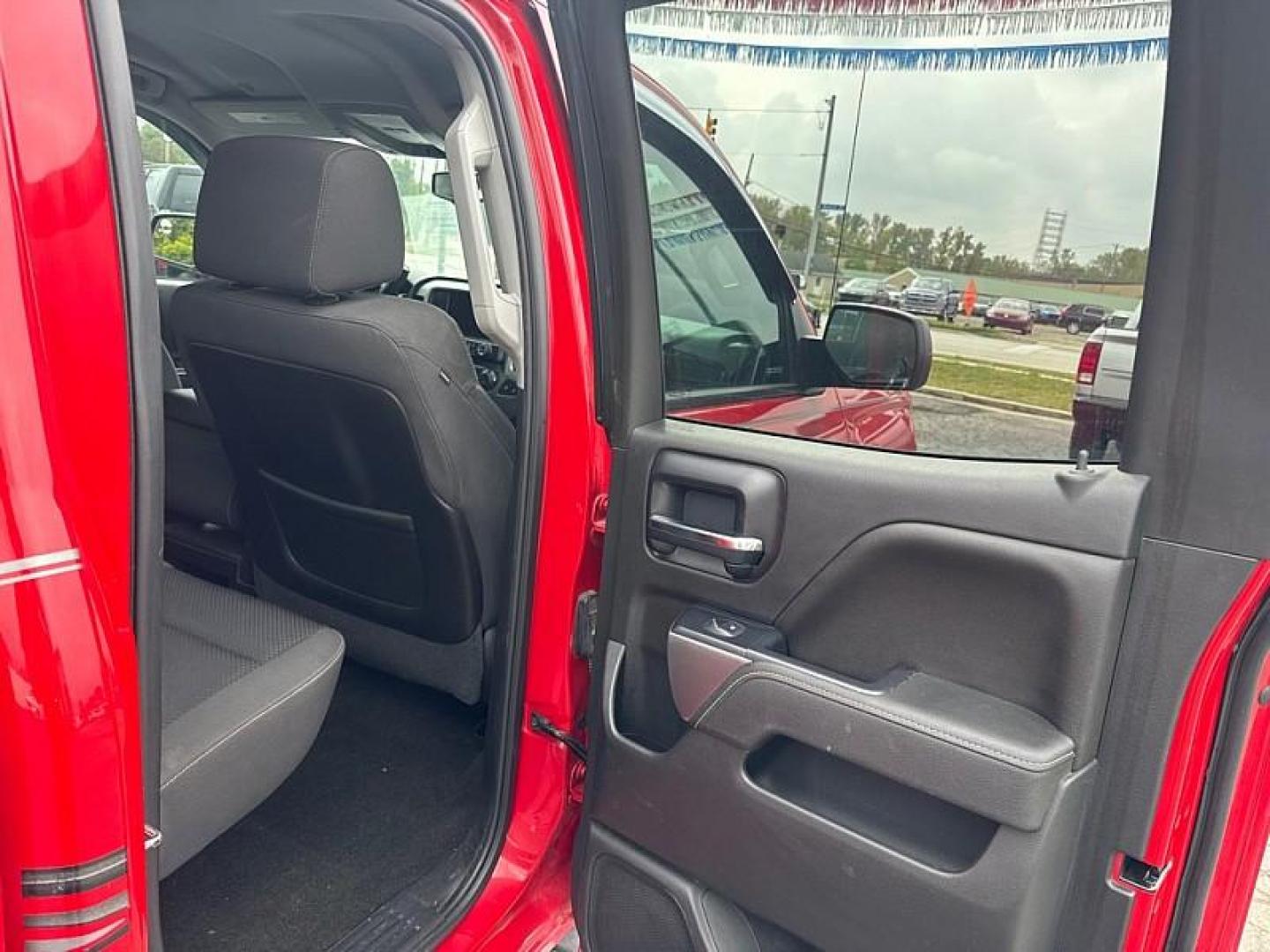2014 RED /BLACK Chevrolet Silverado 1500 1LT Double Cab 4WD (1GCVKREC7EZ) with an 5.3L V8 OHV 16V engine, 6-Speed Automatic transmission, located at 3304 Woodville Road, Northwood, OH, 43619, (419) 210-8019, 41.612694, -83.480743 - Your #1 Destination for Auto Loans and mdash;No Matter Your Credit!At our dealership, we believe everyone deserves the opportunity to drive their dream car and mdash;whether you have good credit, bad credit, or no credit at all. With a wide selection of hundreds of cars, trucks, and SUVs, you'll fin - Photo#12
