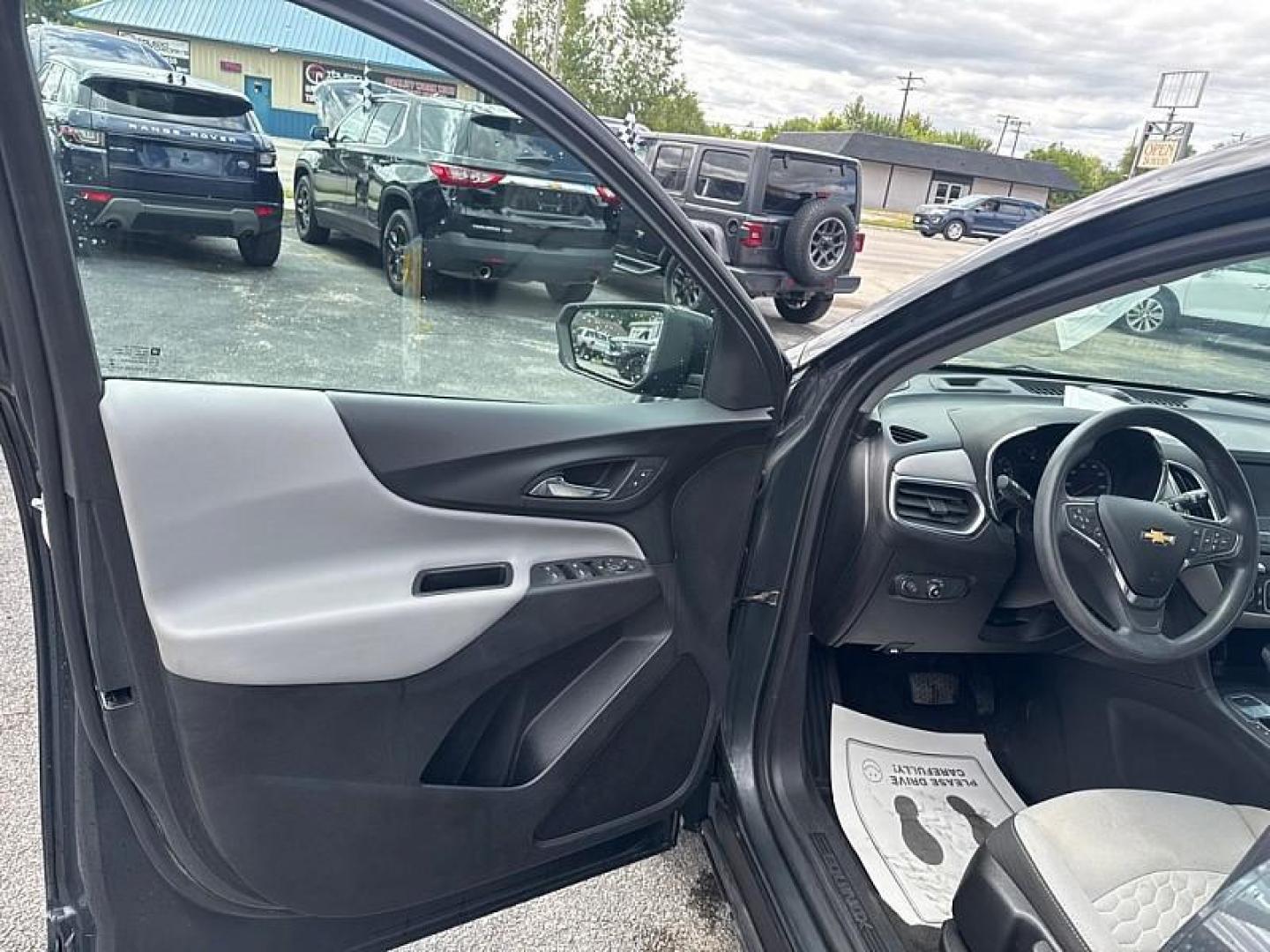 2020 GRAY /GRAY Chevrolet Equinox LS 1.5 AWD (2GNAXSEV7L6) with an 1.5L L4 DIR DOHC 16V TURBO engine, 6A transmission, located at 3304 Woodville Road, Northwood, OH, 43619, (419) 210-8019, 41.612694, -83.480743 - Your #1 Destination for Auto Loans and mdash;No Matter Your Credit!At our dealership, we believe everyone deserves the opportunity to drive their dream car and mdash;whether you have good credit, bad credit, or no credit at all. With a wide selection of hundreds of cars, trucks, and SUVs, you'll fin - Photo#8