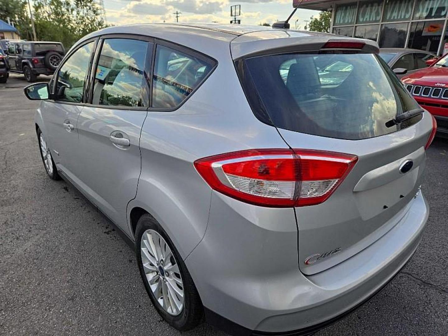 2017 SILVER /GREY Ford C-Max Hybrid SE (1FADP5AU2HL) with an 2.0L L4 DOHC 16V HYBRID engine, CVT transmission, located at 3304 Woodville Road, Northwood, OH, 43619, (419) 210-8019, 41.612694, -83.480743 - Your #1 Destination for Auto Loans and mdash;No Matter Your Credit!At our dealership, we believe everyone deserves the opportunity to drive their dream car and mdash;whether you have good credit, bad credit, or no credit at all. With a wide selection of hundreds of cars, trucks, and SUVs, you'll fin - Photo#2
