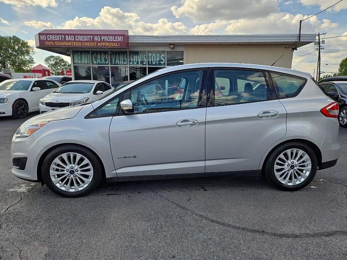 2017 SILVER /GREY Ford C-Max Hybrid SE (1FADP5AU2HL) with an 2.0L L4 DOHC 16V HYBRID engine, CVT transmission, located at 3304 Woodville Road, Northwood, OH, 43619, (419) 210-8019, 41.612694, -83.480743 - Your #1 Destination for Auto Loans and mdash;No Matter Your Credit!At our dealership, we believe everyone deserves the opportunity to drive their dream car and mdash;whether you have good credit, bad credit, or no credit at all. With a wide selection of hundreds of cars, trucks, and SUVs, you'll fin - Photo#1