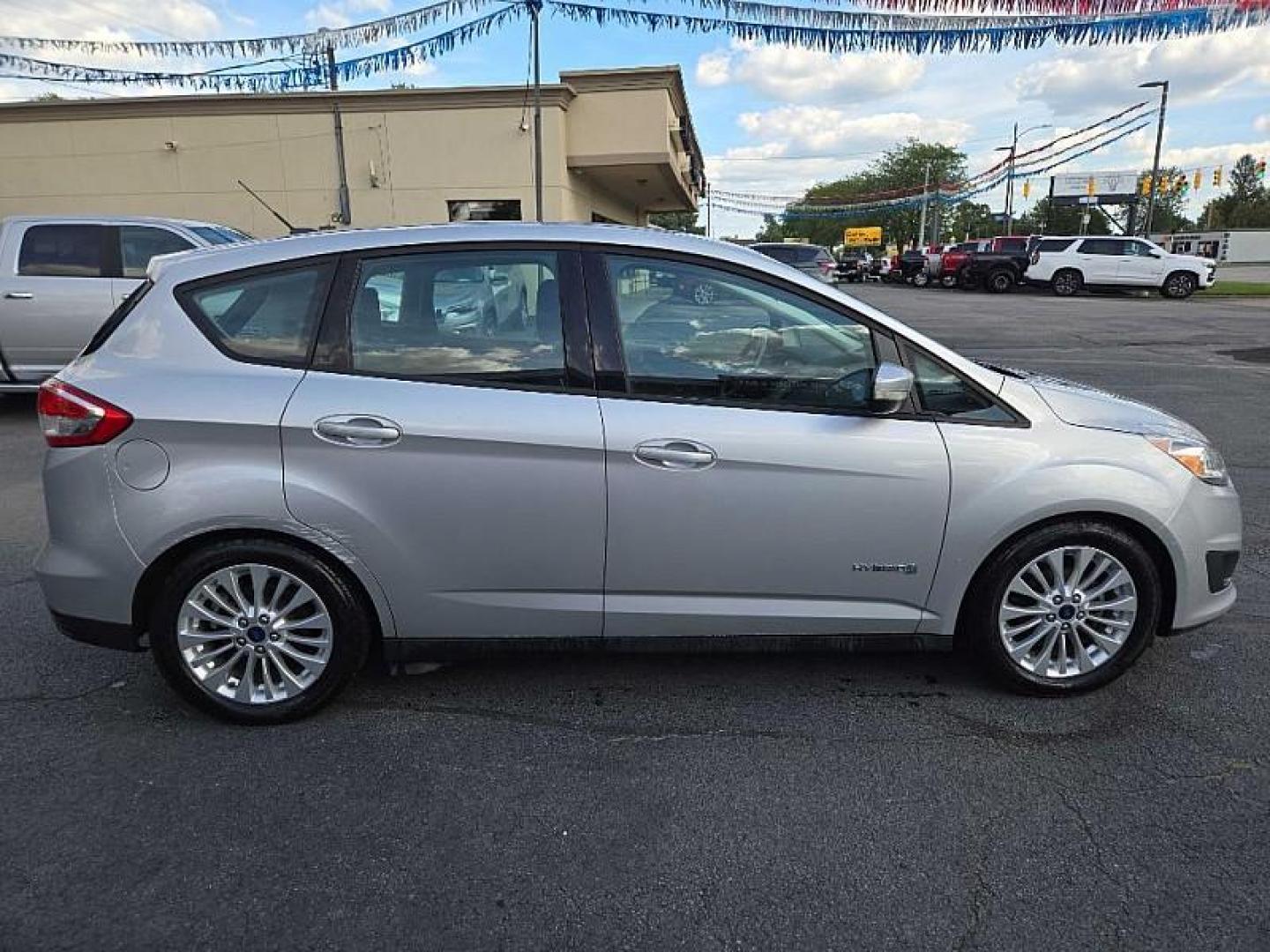2017 SILVER /GREY Ford C-Max Hybrid SE (1FADP5AU2HL) with an 2.0L L4 DOHC 16V HYBRID engine, CVT transmission, located at 3304 Woodville Road, Northwood, OH, 43619, (419) 210-8019, 41.612694, -83.480743 - Your #1 Destination for Auto Loans and mdash;No Matter Your Credit!At our dealership, we believe everyone deserves the opportunity to drive their dream car and mdash;whether you have good credit, bad credit, or no credit at all. With a wide selection of hundreds of cars, trucks, and SUVs, you'll fin - Photo#5