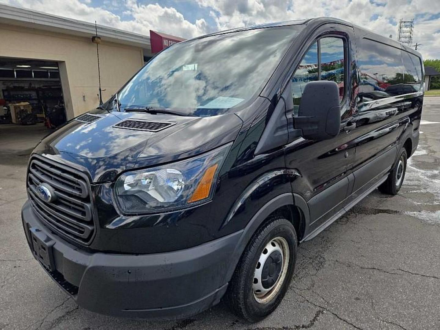 2019 BLACK /GRAY Ford Transit 150 Van Low Roof w/Sliding Pass. 130-in. WB (1FTYE1YM0KK) with an 3.7L V6 DOHC 24V engine, 6A transmission, located at 3304 Woodville Road, Northwood, OH, 43619, (419) 210-8019, 41.612694, -83.480743 - Your #1 Destination for Auto Loans and mdash;No Matter Your Credit!At our dealership, we believe everyone deserves the opportunity to drive their dream car and mdash;whether you have good credit, bad credit, or no credit at all. With a wide selection of hundreds of cars, trucks, and SUVs, you'll fin - Photo#0