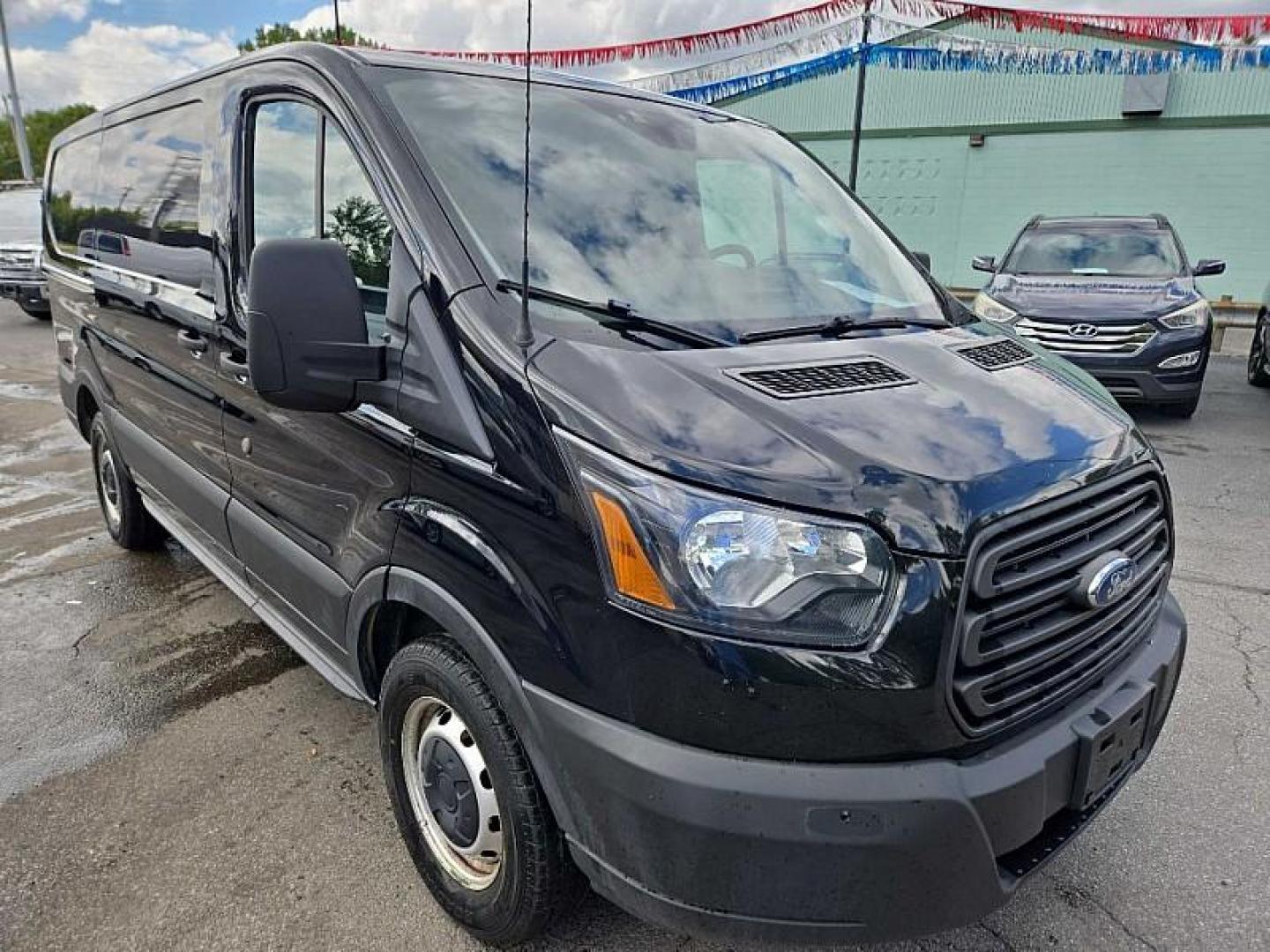 2019 BLACK /GRAY Ford Transit 150 Van Low Roof w/Sliding Pass. 130-in. WB (1FTYE1YM0KK) with an 3.7L V6 DOHC 24V engine, 6A transmission, located at 3304 Woodville Road, Northwood, OH, 43619, (419) 210-8019, 41.612694, -83.480743 - Your #1 Destination for Auto Loans and mdash;No Matter Your Credit!At our dealership, we believe everyone deserves the opportunity to drive their dream car and mdash;whether you have good credit, bad credit, or no credit at all. With a wide selection of hundreds of cars, trucks, and SUVs, you'll fin - Photo#6