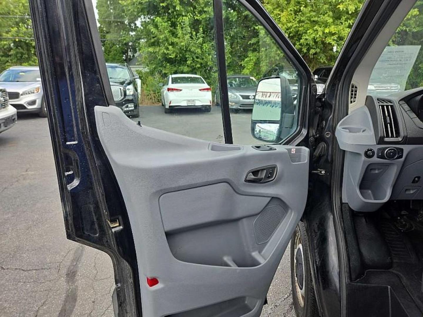 2019 BLACK /GRAY Ford Transit 150 Van Low Roof w/Sliding Pass. 130-in. WB (1FTYE1YM0KK) with an 3.7L V6 DOHC 24V engine, 6A transmission, located at 3304 Woodville Road, Northwood, OH, 43619, (419) 210-8019, 41.612694, -83.480743 - Your #1 Destination for Auto Loans and mdash;No Matter Your Credit!At our dealership, we believe everyone deserves the opportunity to drive their dream car and mdash;whether you have good credit, bad credit, or no credit at all. With a wide selection of hundreds of cars, trucks, and SUVs, you'll fin - Photo#8