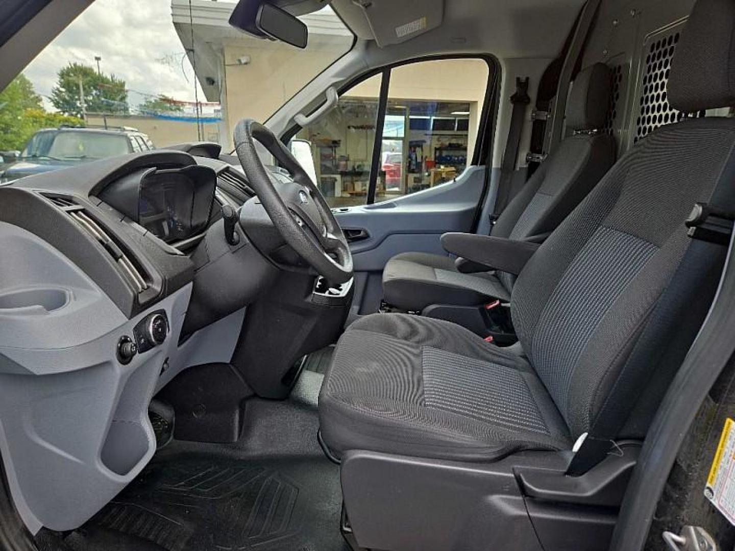 2019 BLACK /GRAY Ford Transit 150 Van Low Roof w/Sliding Pass. 130-in. WB (1FTYE1YM0KK) with an 3.7L V6 DOHC 24V engine, 6A transmission, located at 3304 Woodville Road, Northwood, OH, 43619, (419) 210-8019, 41.612694, -83.480743 - Your #1 Destination for Auto Loans and mdash;No Matter Your Credit!At our dealership, we believe everyone deserves the opportunity to drive their dream car and mdash;whether you have good credit, bad credit, or no credit at all. With a wide selection of hundreds of cars, trucks, and SUVs, you'll fin - Photo#9