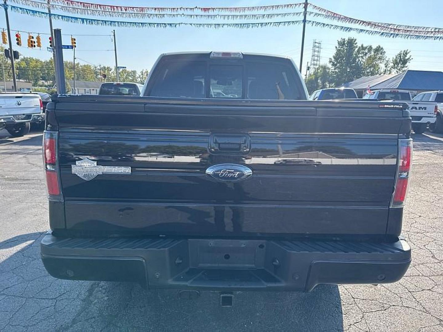 2010 BLACK /BROWN Ford F-150 Lariat SuperCrew 5.5-ft. Bed 4WD (1FTFW1EV1AF) with an 5.4L V8 SOHC 24V FFV engine, 4-Speed Automatic transmission, located at 3304 Woodville Road, Northwood, OH, 43619, (419) 210-8019, 41.612694, -83.480743 - Your #1 Destination for Auto Loans and mdash;No Matter Your Credit!At our dealership, we believe everyone deserves the opportunity to drive their dream car and mdash;whether you have good credit, bad credit, or no credit at all. With a wide selection of hundreds of cars, trucks, and SUVs, you'll fin - Photo#3